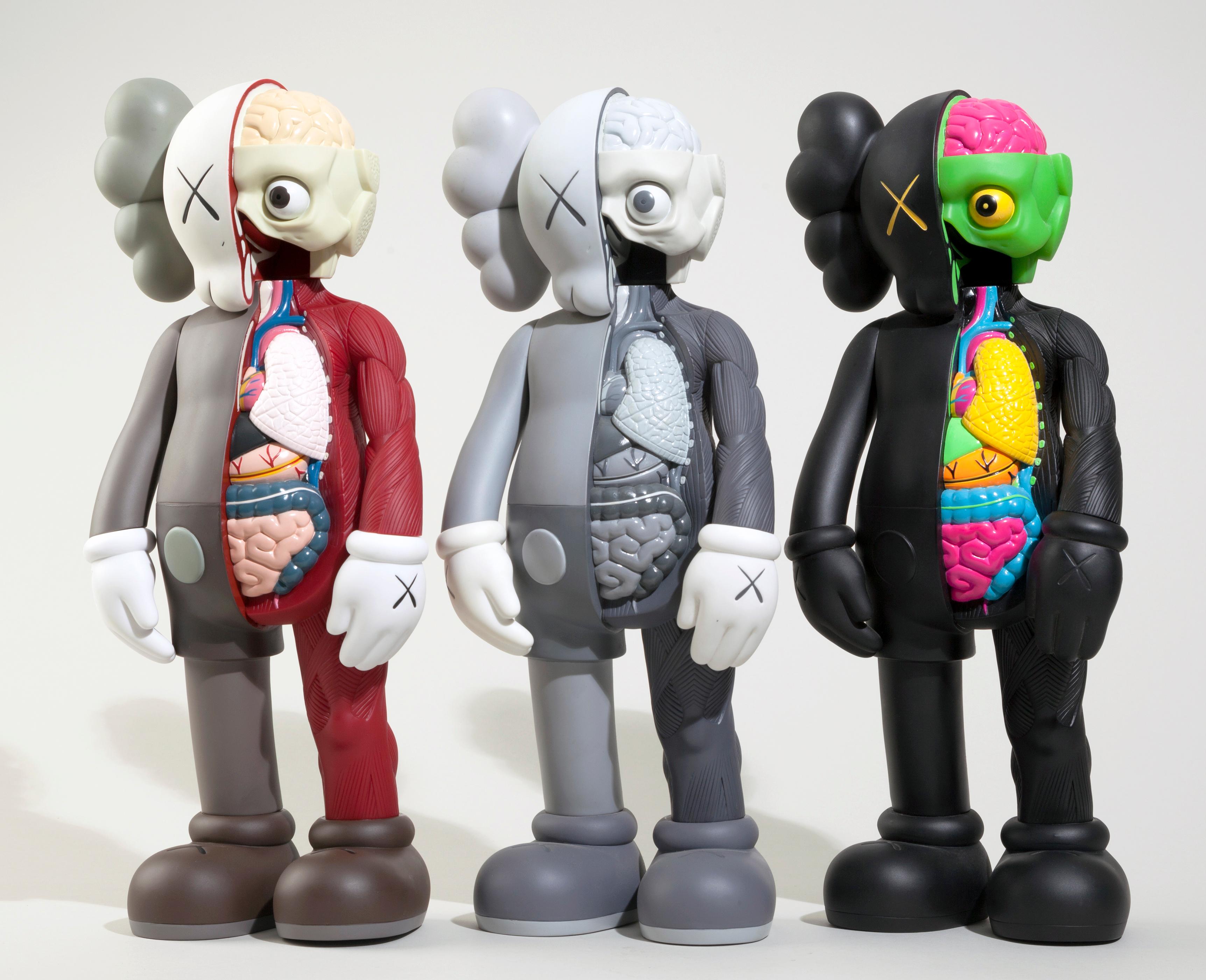 KAWS Companion: Set of 3 Flayed Companions. Each, new and sealed in its original packaging. Published by Medicom Japan in conjunction with the exhibition, KAWS: Where The End Starts at the Modern Art Museum of Fort Worth in 2016. These figurines