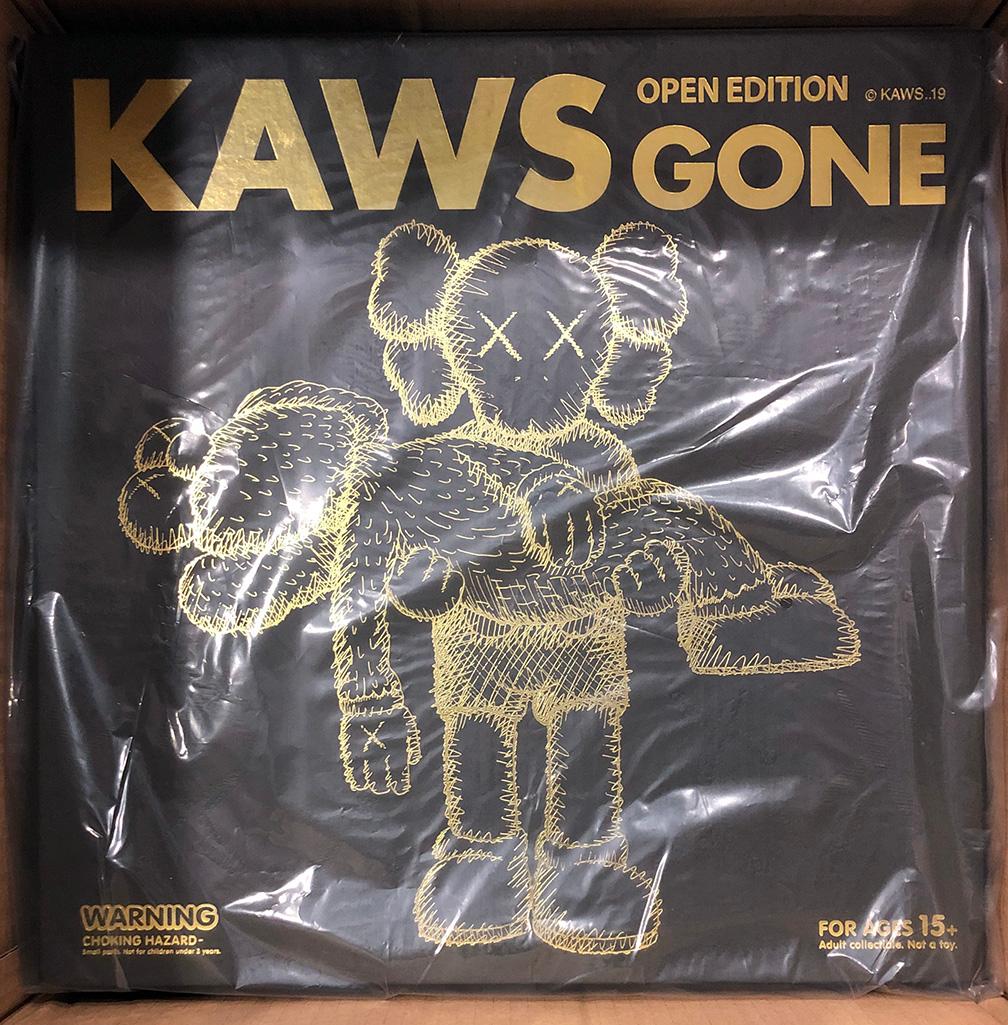 KAWS GONE (Black), new & unopened in its original packaging. 
A well-received work and variation of KAWS' large scale GONE sculpture - a key highlight of KAWS’ recent exhibition, 'KAWS: Companionship in the Age of Loneliness' at National Gallery of