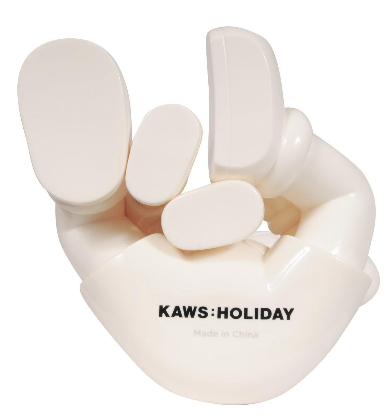 KAWS Holiday Changbai Mountain (KAWS Changbai white): 
A beautifully composed snowy-white KAWS COMPANION published to commemorate KAWS' larger-scale sculpture of same, at Changbai Mountain in Jilin Province, China. The piece features the signature