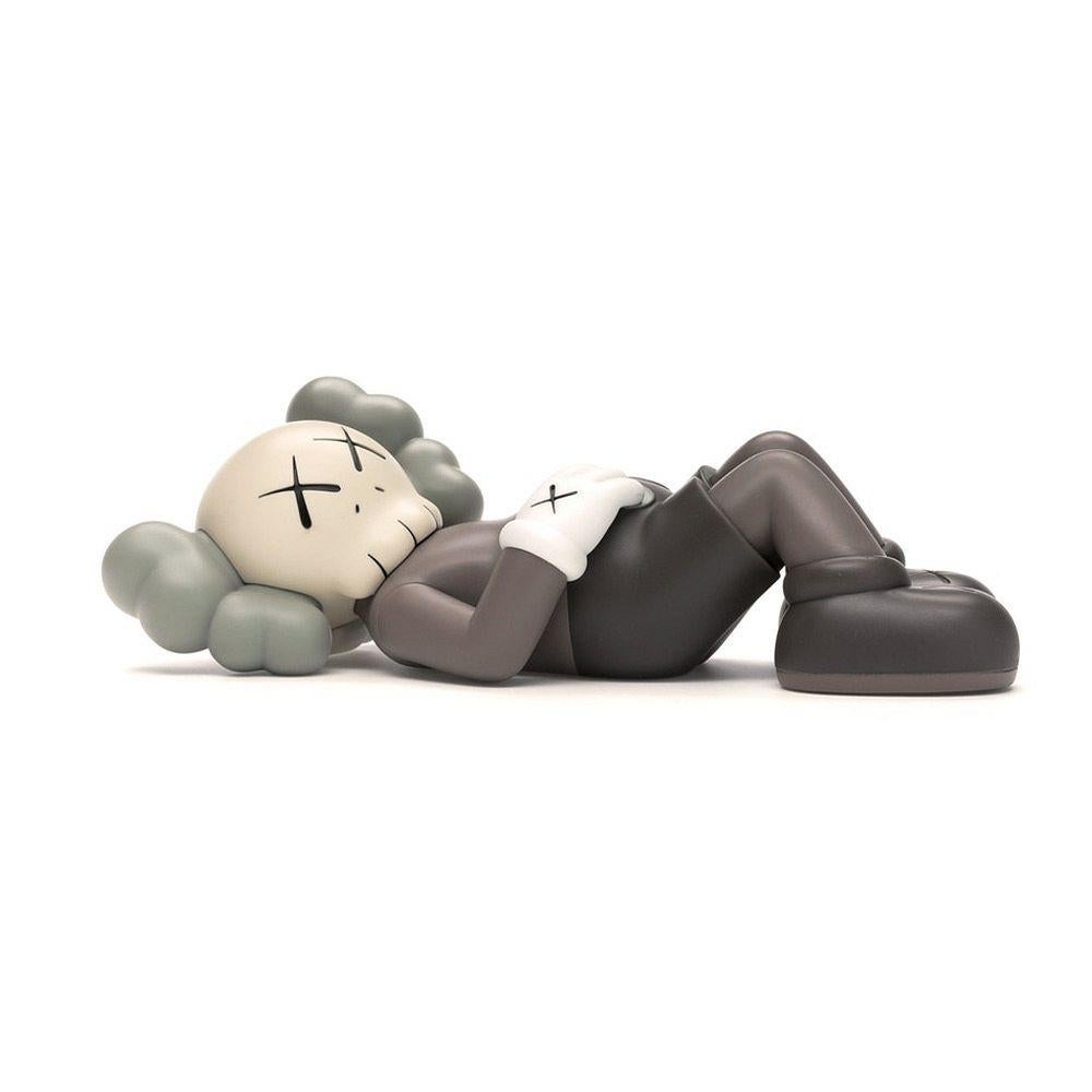 KAWS Brown Holiday Companion Japan (KAWS Mount Fuji Japan): 
This sold out KAWS figurative piece features KAWS' signature character COMPANION in a resting position. Published by All Rights Reserved to commemorate the debut of KAWS’ 40-meters-long