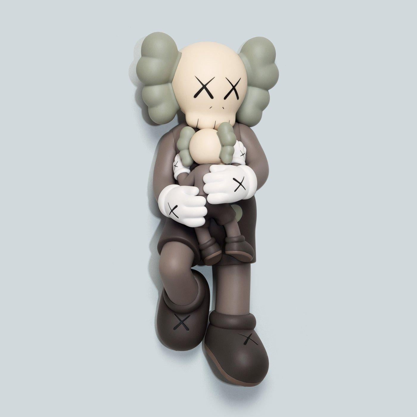 KAWS Brown Holiday Companion (KAWS Singapore): 
This standout KAWS art toy features KAWS' signature character COMPANION in a resting position. Published to commemorate the debut of KAWS’ 42-meter inflatable work of same along Singapore's Marina Bay