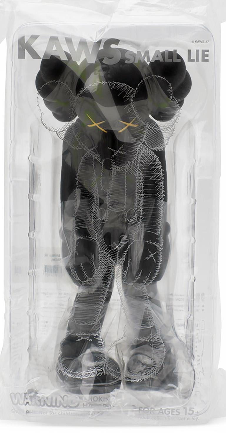 KAWS Small Lie Companion: Set of 2 works (black and grey). Each new and sealed in their original packaging. 

Among KAWS’s signature “Companions,” Small Lie has the most childlike resonance. Clothed in overall shorts, the Pinocchio-inspired figure