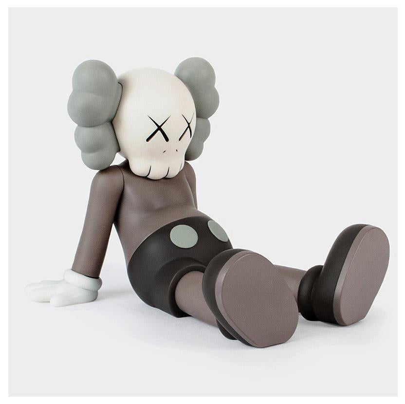 KAWS Brown Holiday Companion (KAWS Taipei) 
This figurine features KAWS' signature character COMPANION in a resting seated position. The piece was published by All Rights Reserved to commemorate the debut of KAWS’ largest sculptural endeavor to