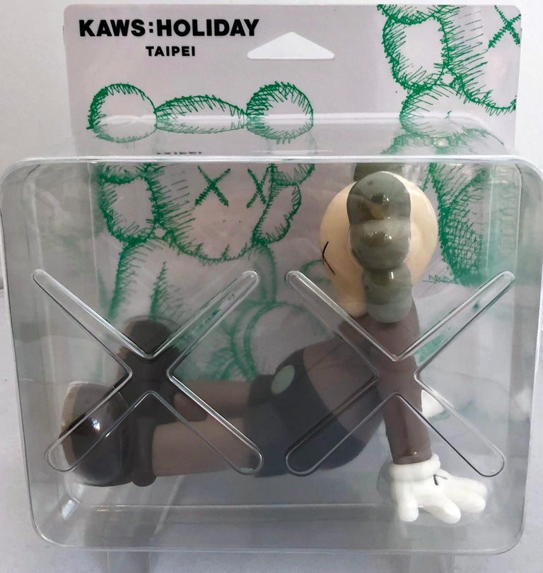 KAWS Taipei Holiday Companion, Set of 2 (KAWS Brown & Grey Companion): 
KAWS' signature character COMPANION presented in a resting seated position. 2 individual pieces (brown, & grey). Each published by All Rights Reserved to commemorate the debut