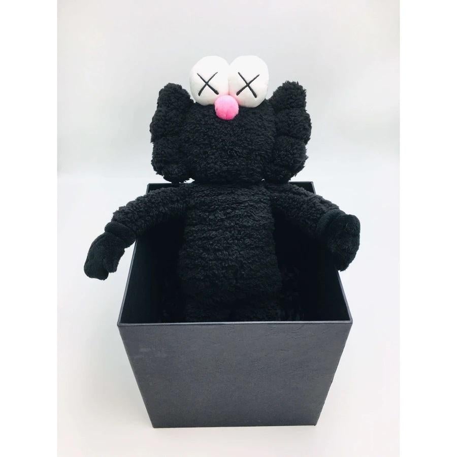 Polyester
Edition of 3,000 
Numbered on attached swing tag
New, as issued, slight abrasion on base of box, this does not effect the figure. Some minor imperfections may exist to the plush and box due to the nature of the material.
Sold as new in the