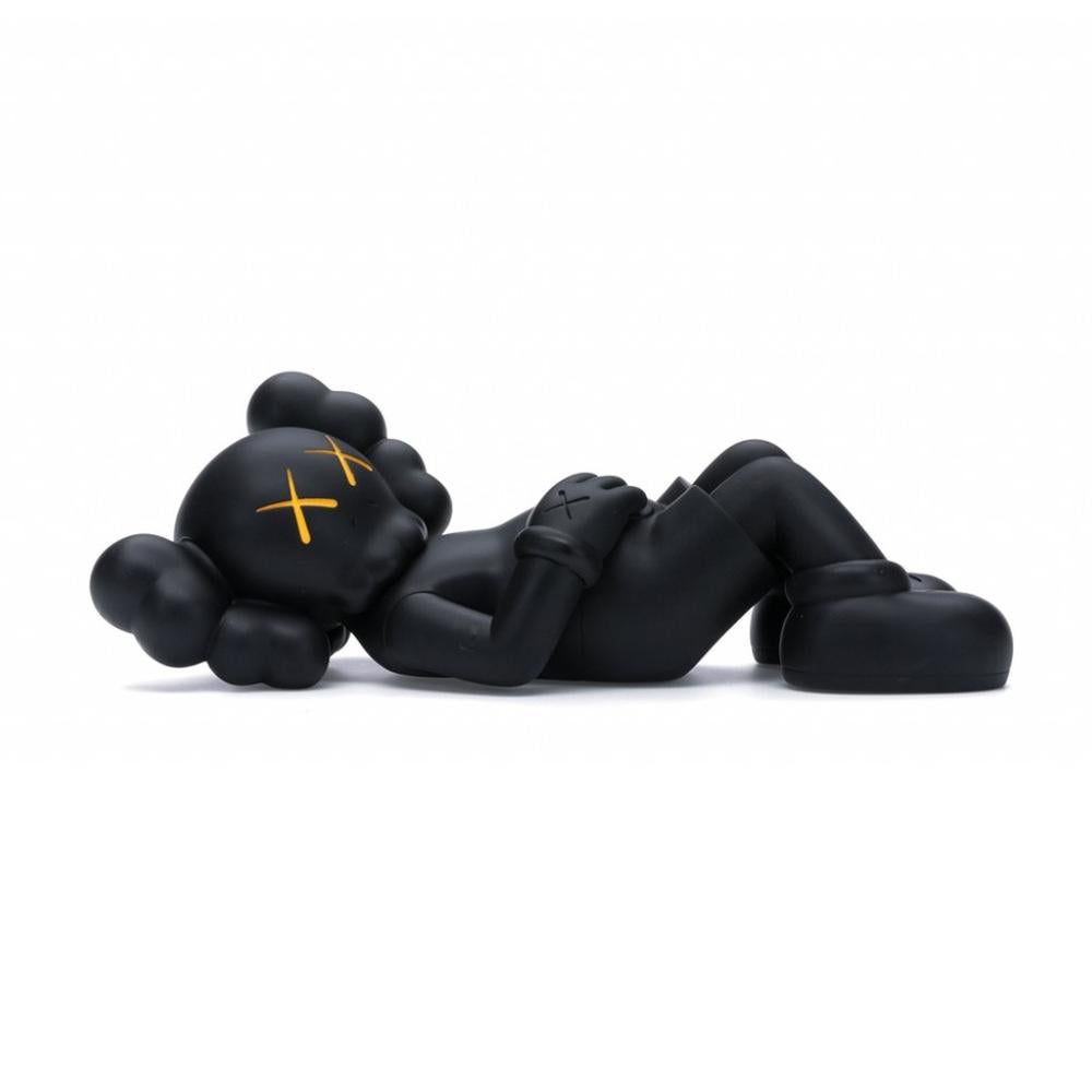 kaws laying down