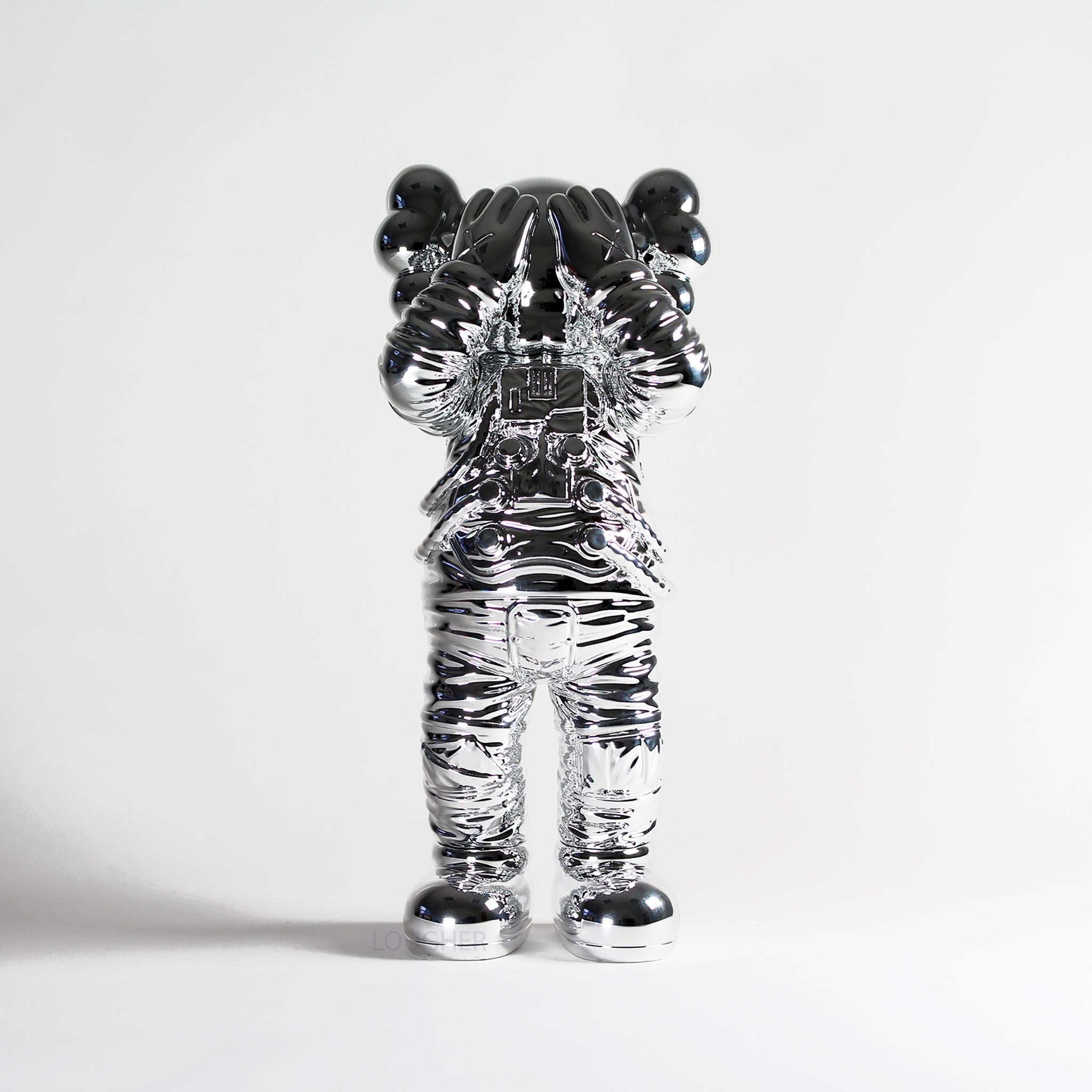 KAWS Figurative Sculpture - Holiday Space (Silver)