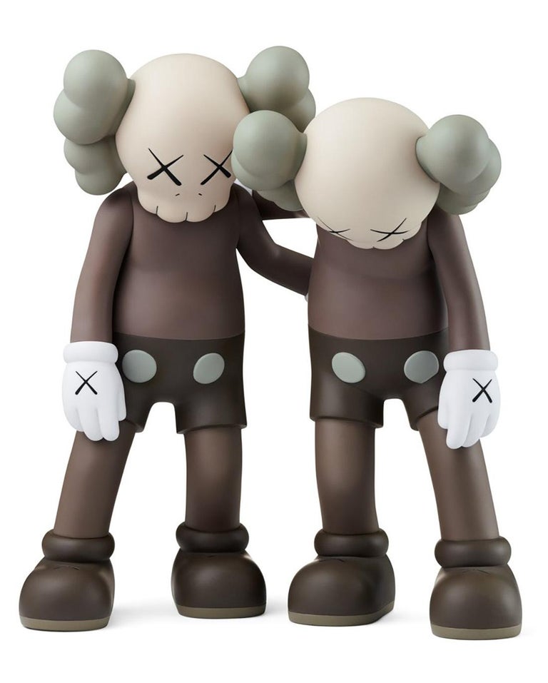 KAWS Brown Along The Way Companion. New and unopened in its original box. The KAWS Along The Way figurine is a rendition of the artist's 2013 eighteen-foot wood sculpture originally exhibited at Mary Boone gallery New York. The KAWS Along The Way