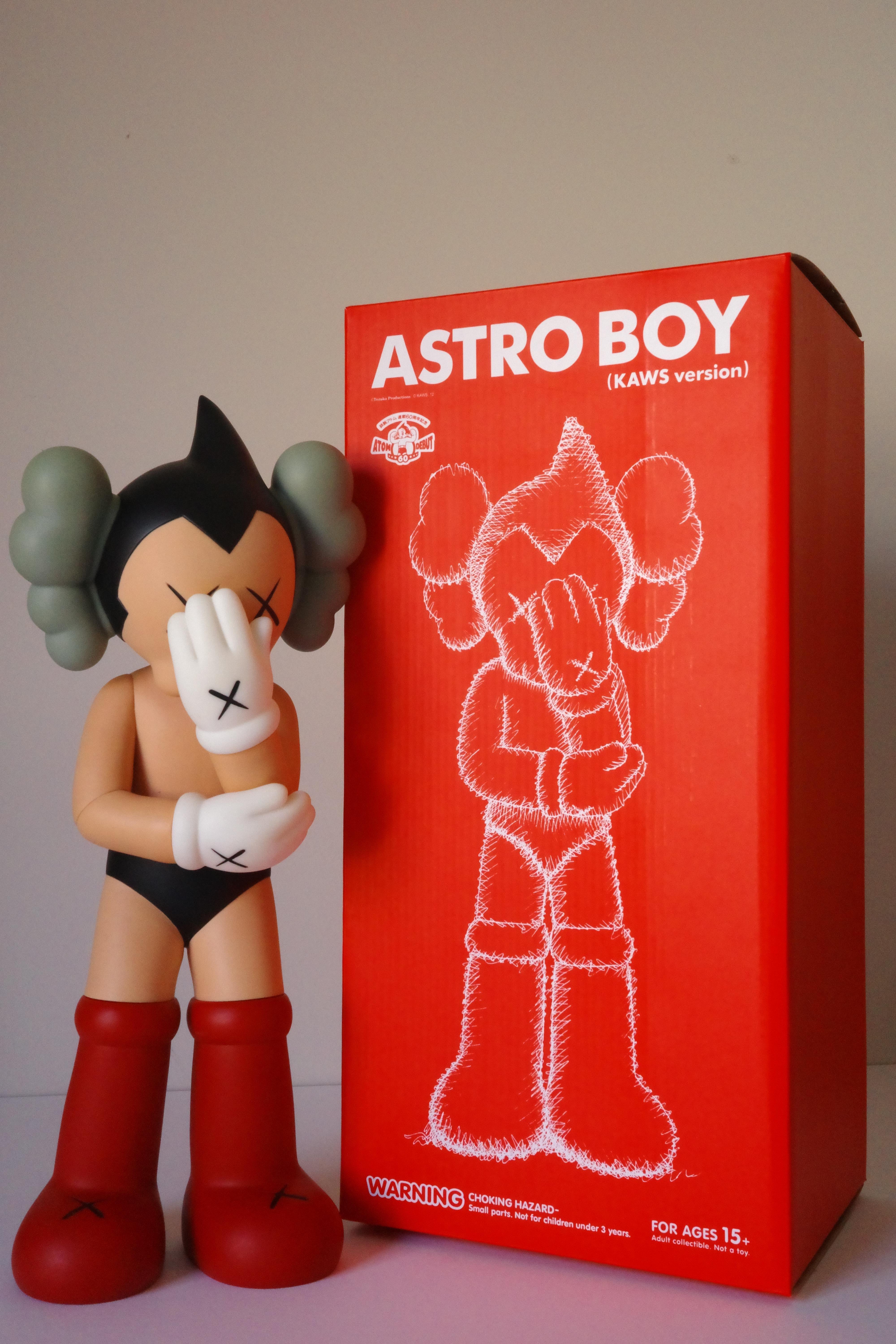 KAWS 
Astro Boy, 2012
Painted cast vinyl
Size 37.5 × 15.2 × 11e cm
From Limited edition 300
with 'Medicom Toy 2012 China' and 'Tezuka Productions Designed by Kaws' stamp on the underside
Come with the original box 