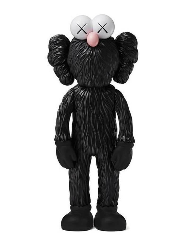 KAWS Black BFF new, unopened in its original packaging. 
A well-received work and variation of KAWS' large scale BFF sculpture is in Los Angeles's Playa Vista neighborhood.

Medium: Vinyl Paint, Cast Resin.
13 x 5.7 x 3.25 inches.
New and sealed in