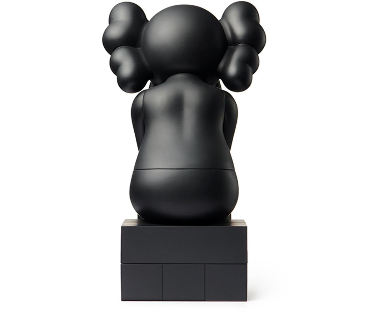 KAWS Black Companion Passing Through 2018. Black colorway. New and sealed in its original packaging. 
The most iconic of the KAWS Companions. Published by Kaws One, these figurines have since sold out.

Medium: Painted Vinyl, Cast Resin.
Dimensions: