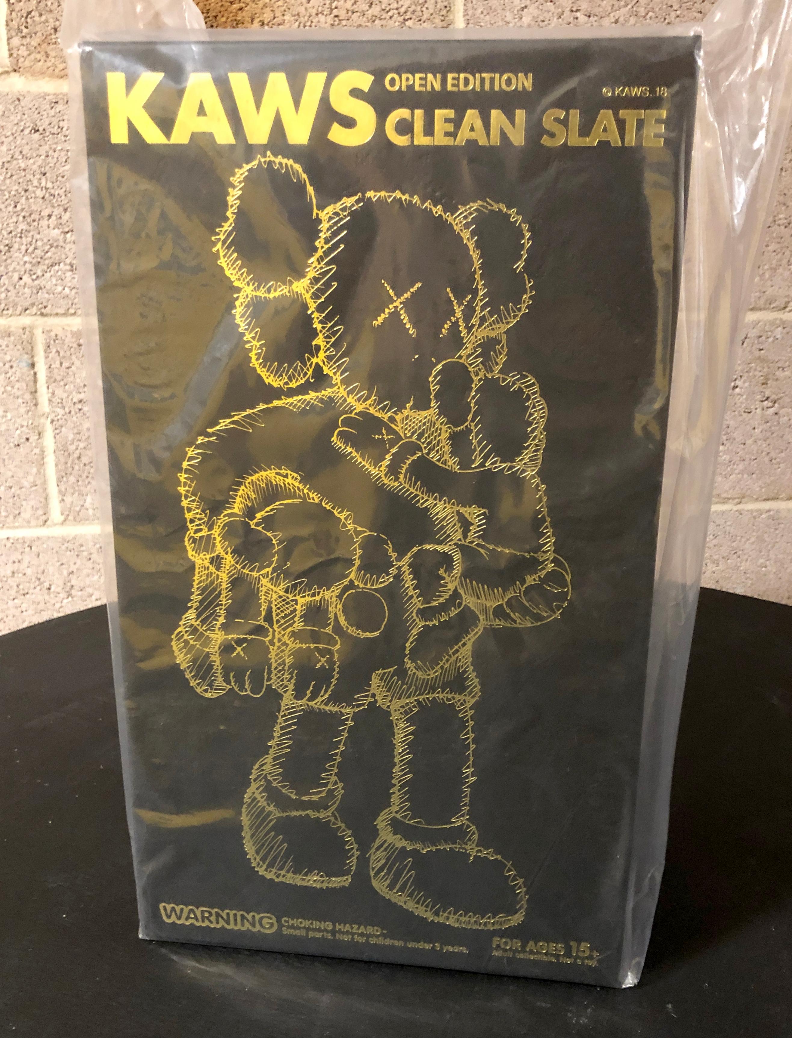 KAWS Clean Slate (Black), new & unopened in its original packaging. 
Sold Out  after the artist's retrospect exhibition at the Modern Art Museum of Fort Worth

Medium: Vinyl & Cast Resin
14.25 x 7 x 7 inches
Artwork in excellent condition.
