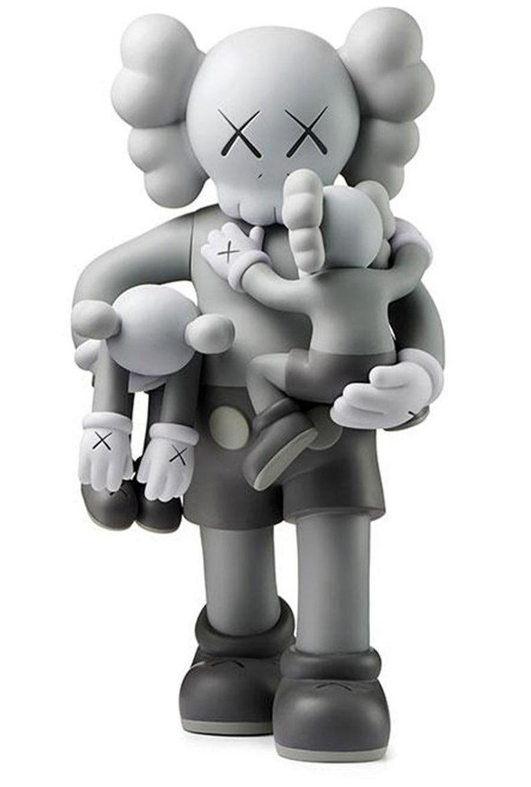 KAWS Clean Slate Set of 2 (Black & Grey), new & unopened in their original packaging. 
A well-received work and variation of KAWS' large scale Clean Slate sculpture - a key highlight of KAWS’ major museum exhibition KAWS: WHERE THE END STARTS where