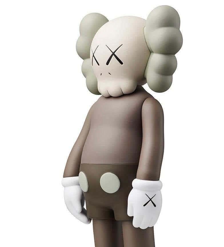 KAWS Brown Companion, 2016. New and sealed in its original packaging. This classic KAWS figurative sculpture was published by Medicom Japan in conjunction with the exhibition, KAWS: Where The End Starts at the Modern Art Museum of Fort Worth.