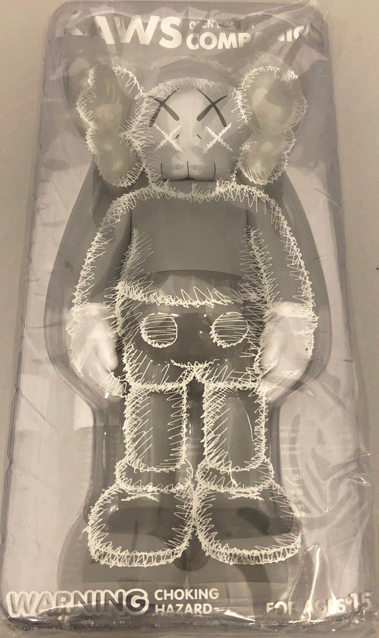 KAWS Grey Companion, 2016. New and sealed in its original packaging. Published by Medicom Japan in conjunction with the exhibition, KAWS: Where The End Starts at the Modern Art Museum of Fort Worth. ThIs figurine has since sold out. 

Medium: Vinyl,