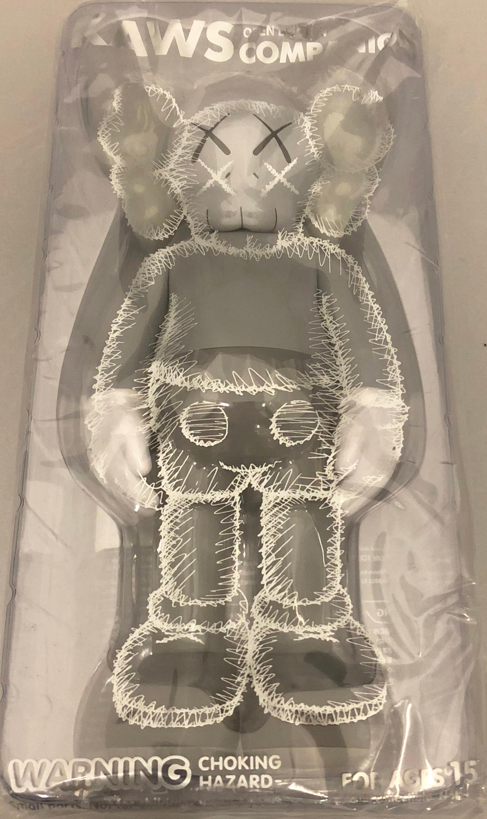 KAWS Companion Grey: set of 2 individual works; 2016. Each new and sealed in their original packaging. Published by Medicom Japan in conjunction with the exhibition, KAWS: Where The End Starts at the Modern Art Museum of Fort Worth. These figurines