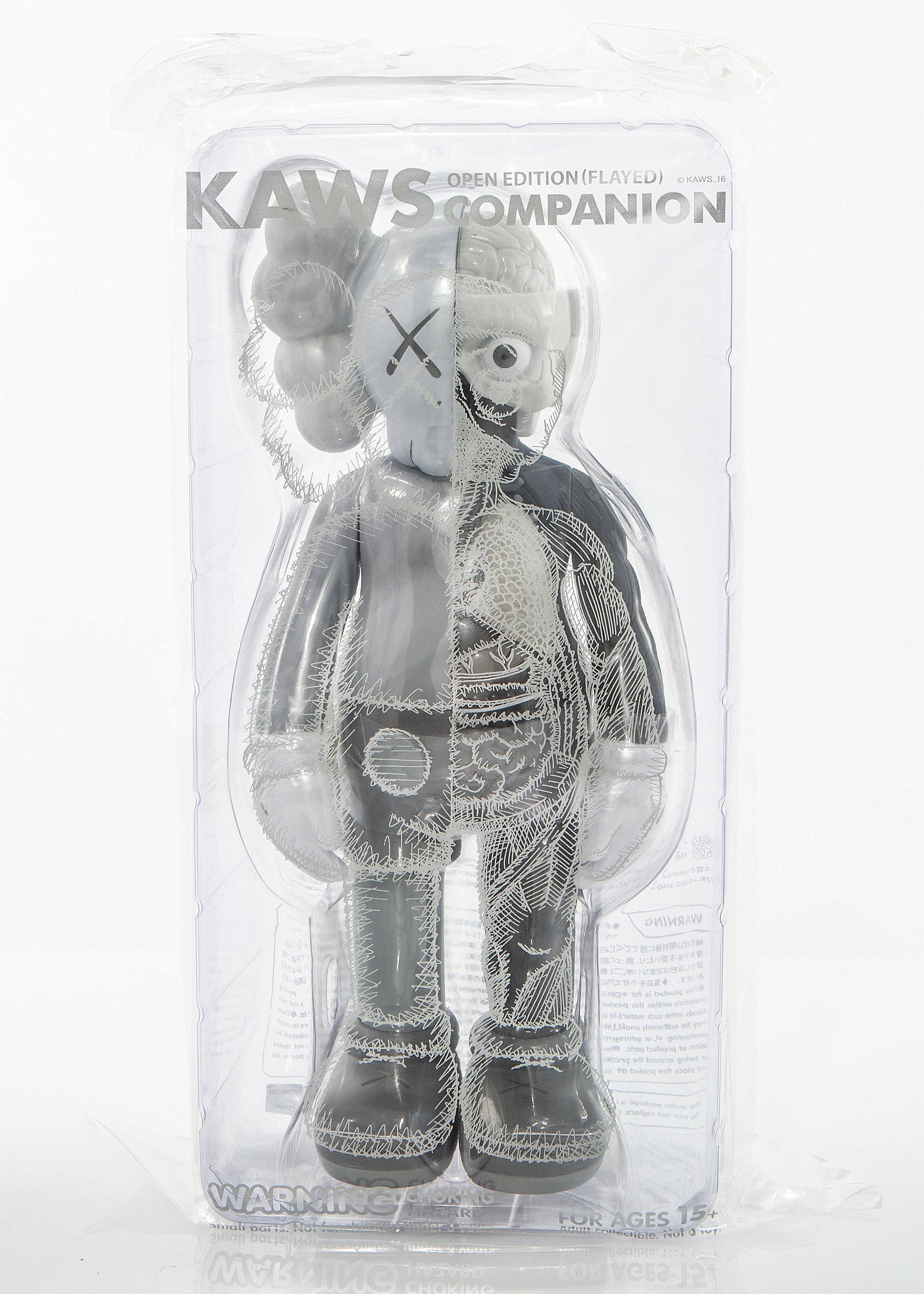 KAWS Companion 2016. Gray, Flayed (dissected) toy figure, brand new, sealed in original packaging. 
Published by Medicom Japan in conjunction with the exhibition KAWS: Where The End Starts at the Modern Art Museum of Fort Worth. 
The figurines have