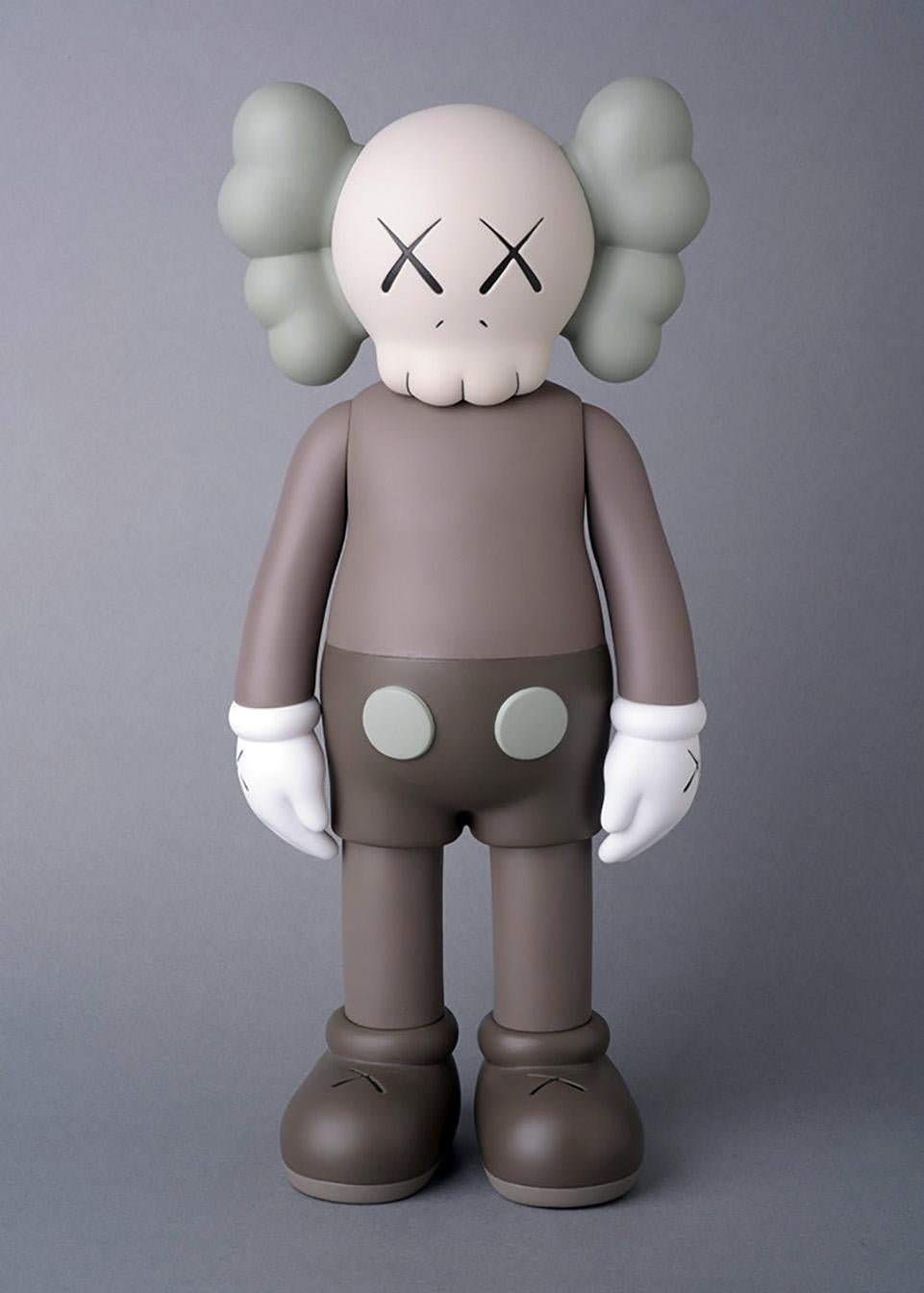Brown KAWS Companions: Set of 2. Each, new and sealed in their original packaging. Published by Medicom Japan in conjunction with the exhibition, KAWS: Where The End Starts at the Modern Art Museum of Fort Worth in 2016. These figurines have since