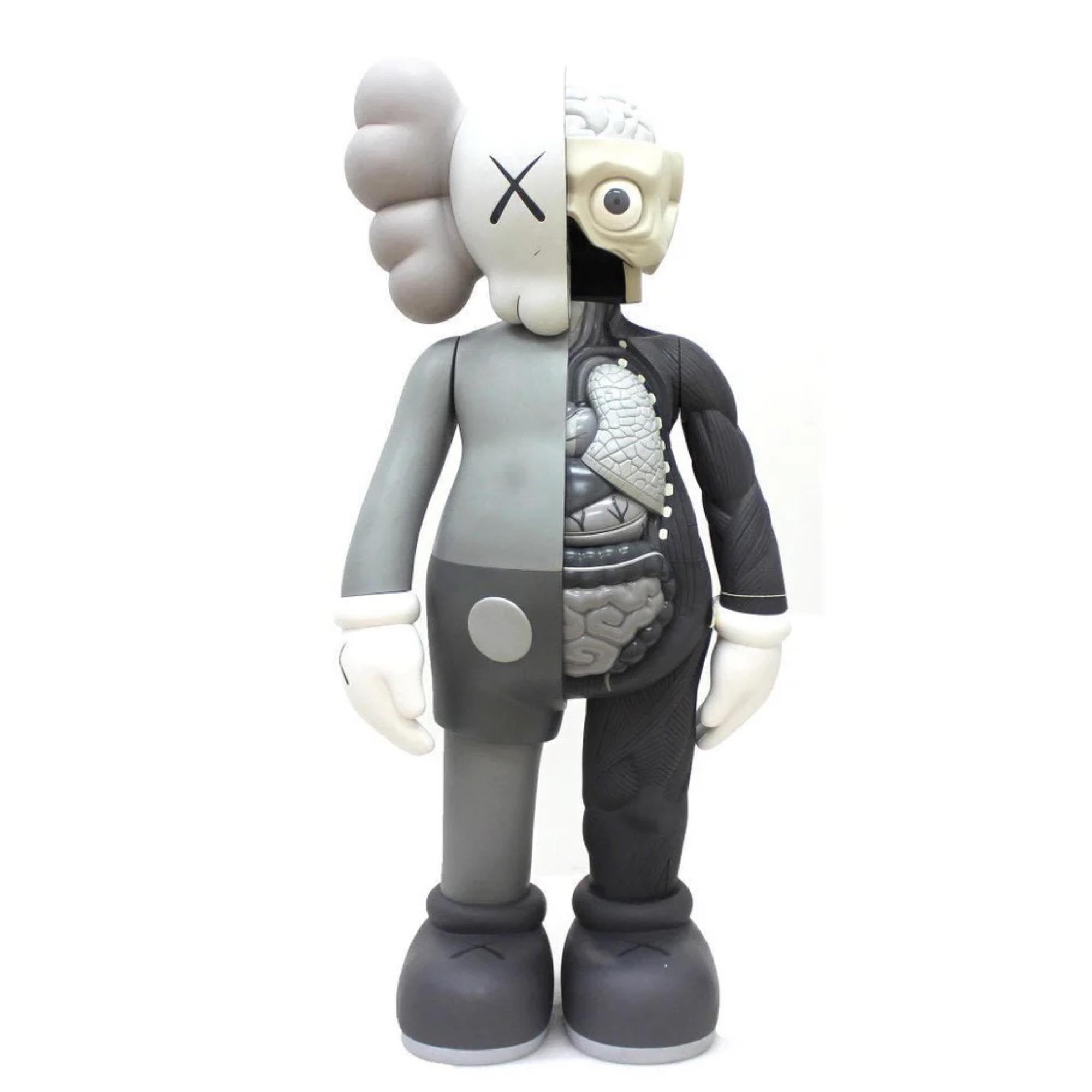 How do I tell if a KAWS figure is real?