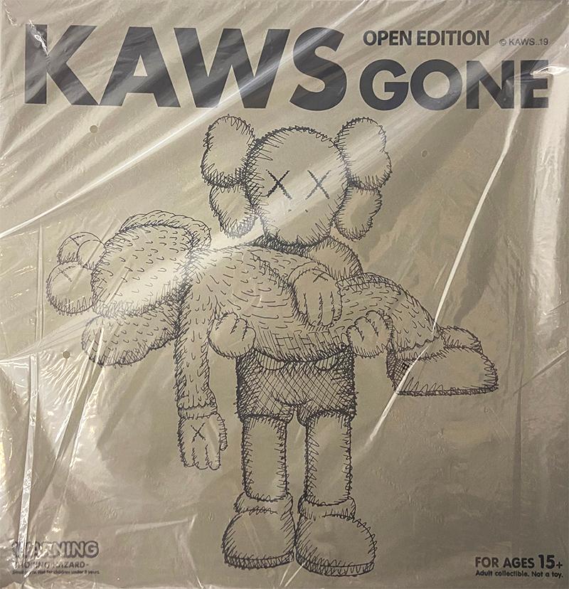 KAWS GONE: Set of 2 (Grey & Brown), new & unopened in their original packaging. 

A well-received work and variation of KAWS' large scale GONE sculpture - a key highlight of KAWS’ recent exhibition, 'KAWS: Companionship in the Age of Loneliness' at