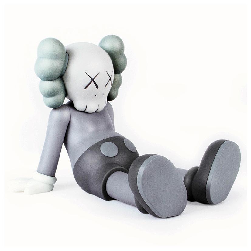 kaws figure sitting down