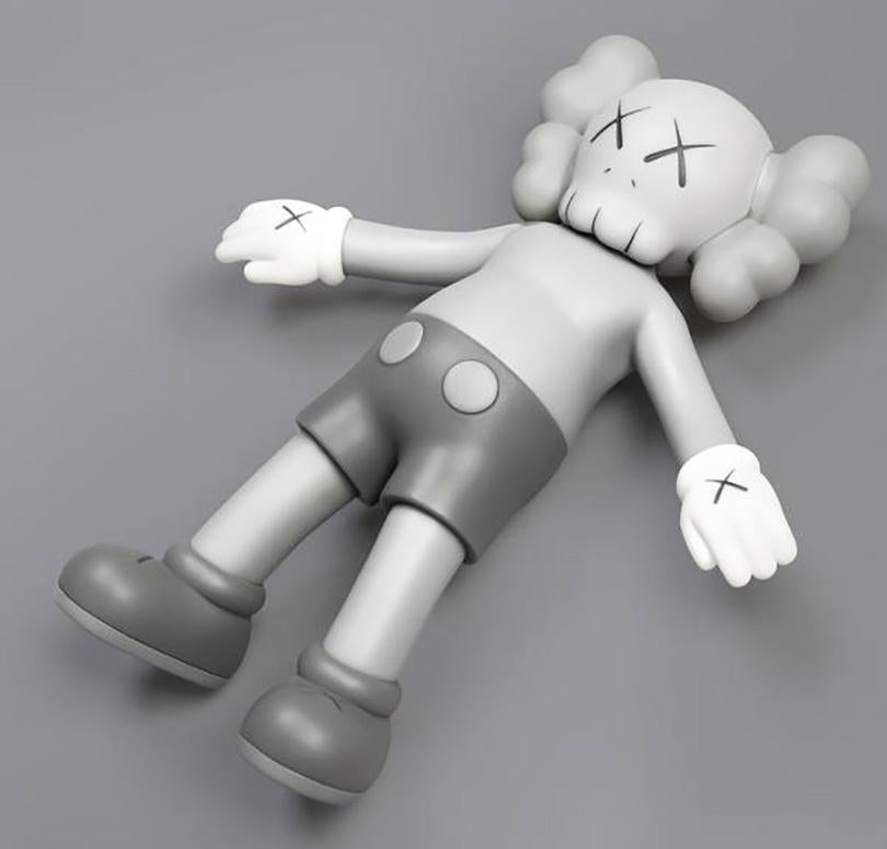 KAWS 'Holiday' Companion 
This figurine was published by All Rights Reserved to commemorate the debut of a large scale KAWS floating figure in Hong Kong's Victoria Harbour in 2019. New in its original packaging. 

Medium: Vinyl
Year: