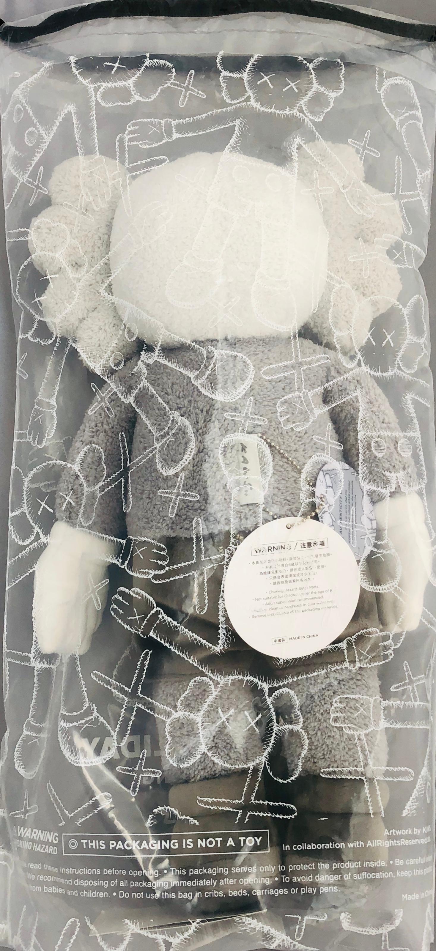 KAWS Holiday Companion plush (KAWS plush grey) 1
