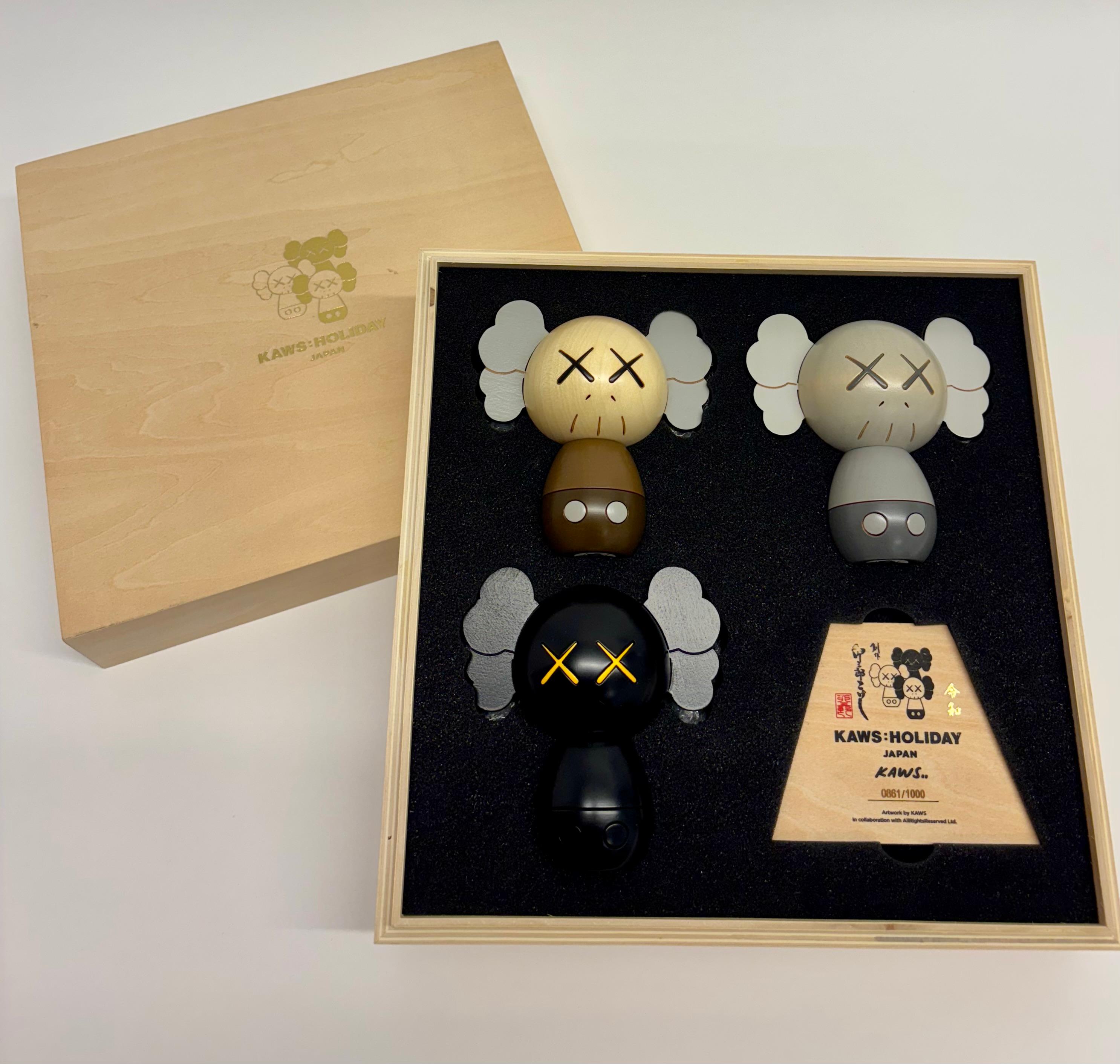 KAWS Holiday Japan Kokeshi wood (set of 3 works) For Sale 1