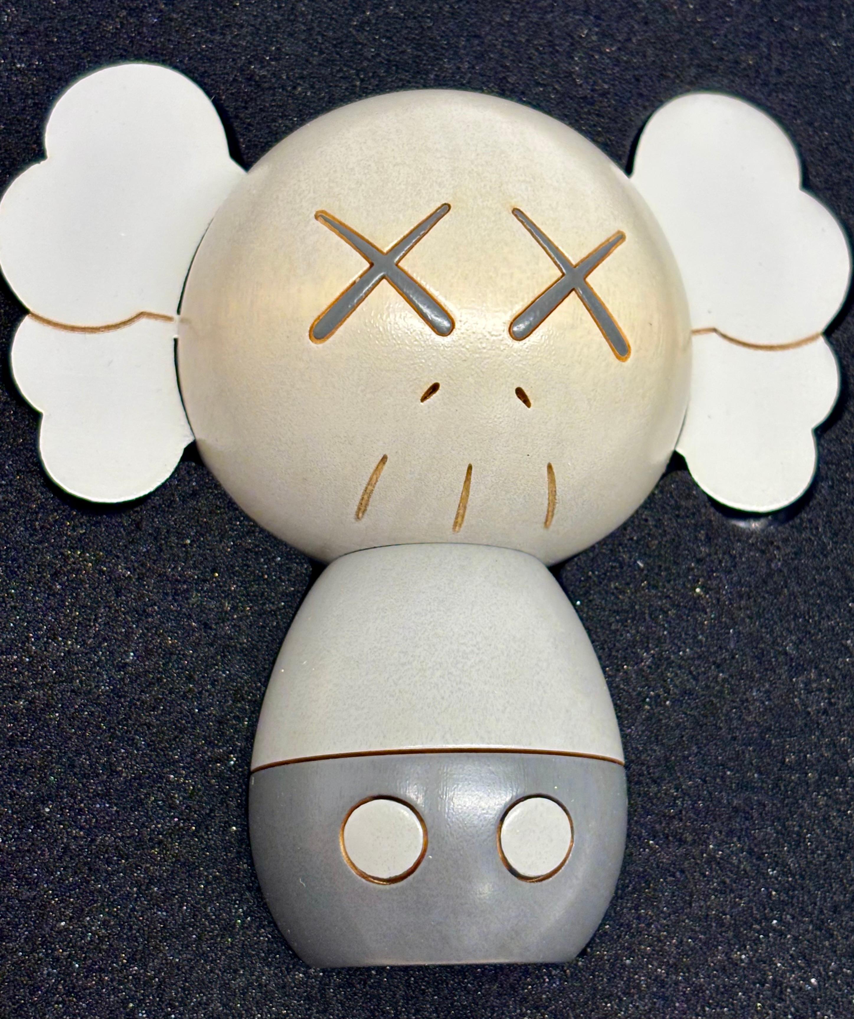 KAWS Holiday Japan Kokeshi wood (set of 3 works) For Sale 4