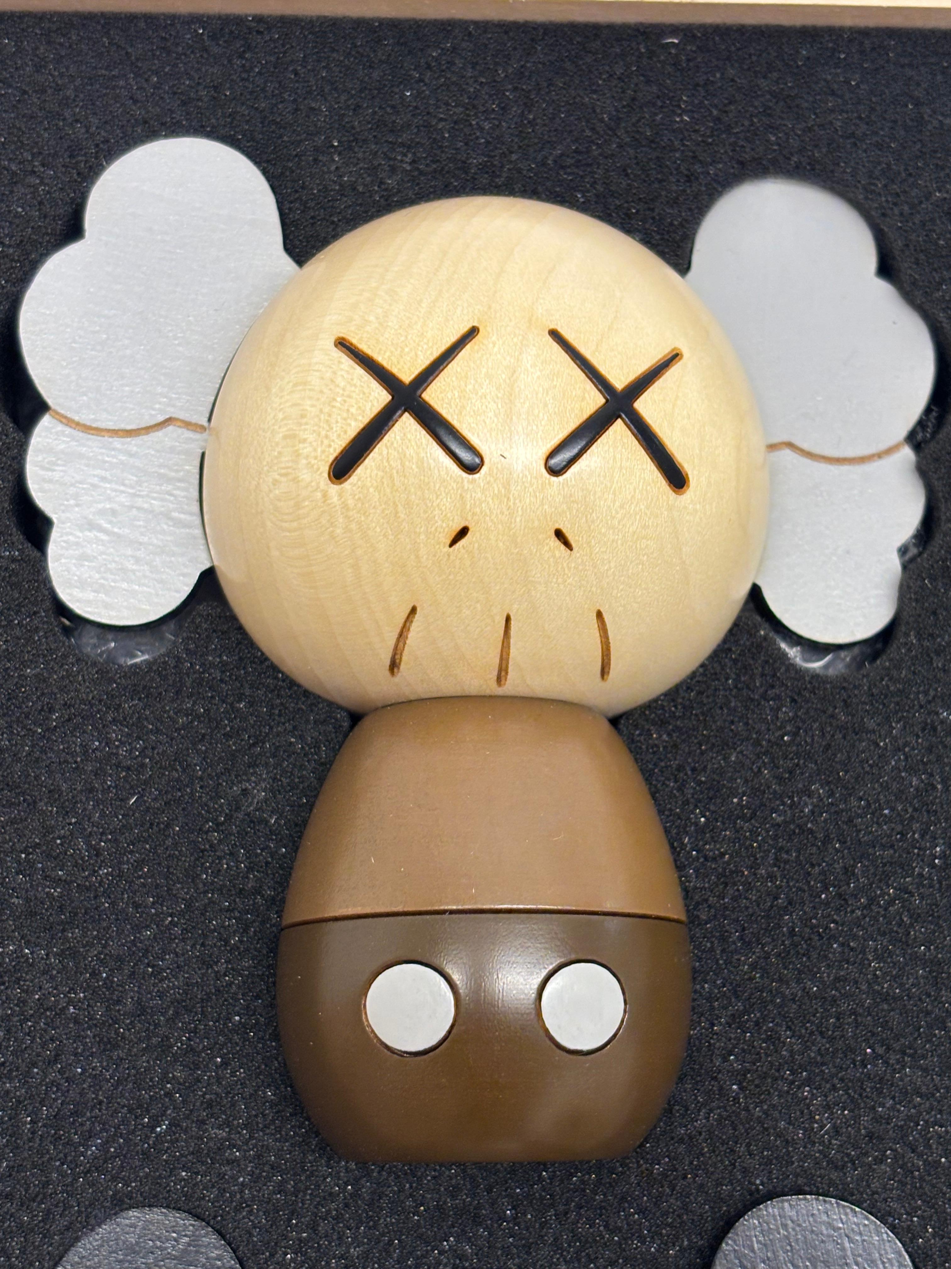 KAWS Holiday Japan Kokeshi wood (set of 3 works) For Sale 5