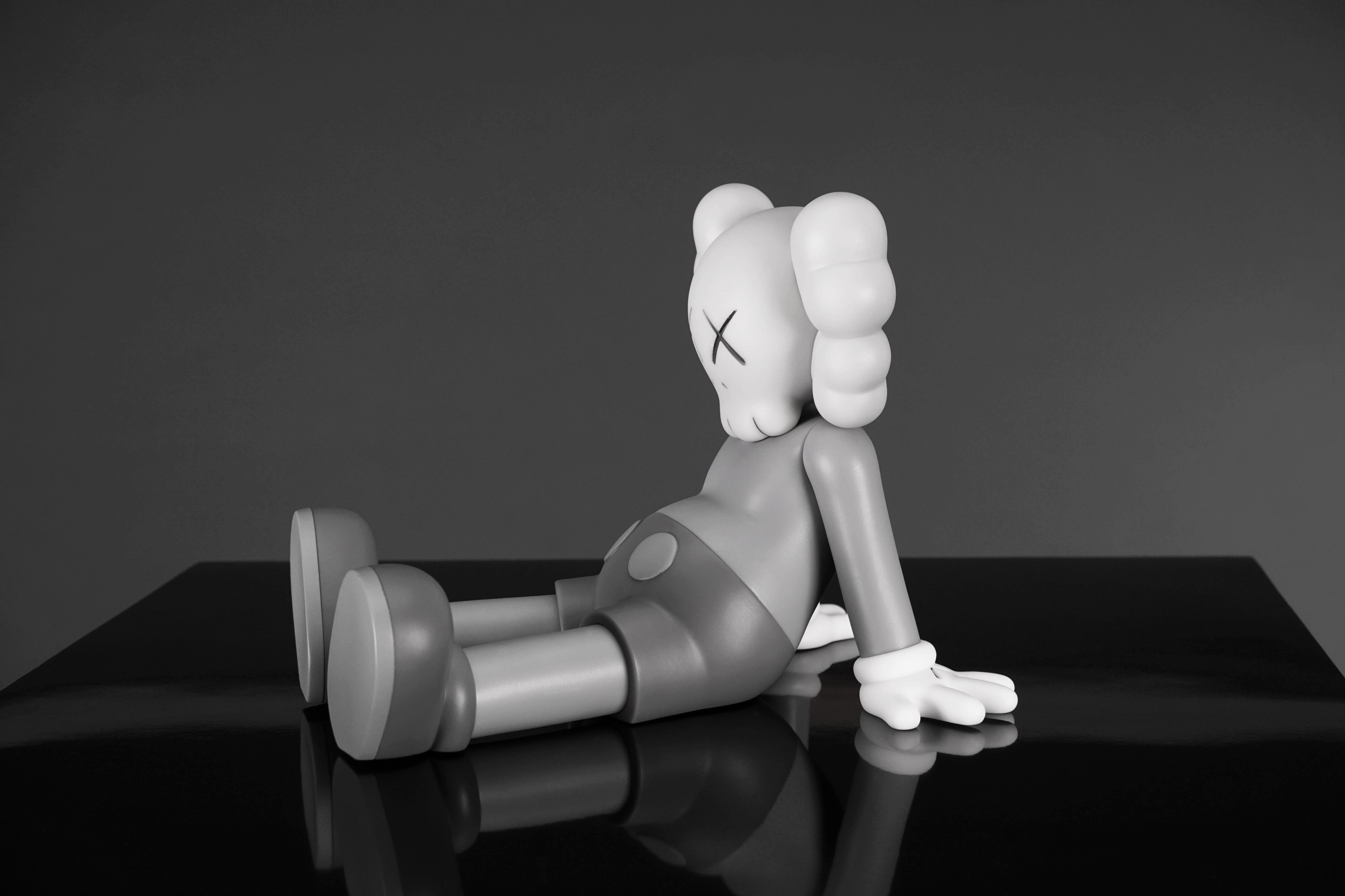 grey kaws wallpaper
