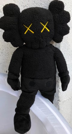 KAWS Holiday Plush Companion (KAWS black plush)