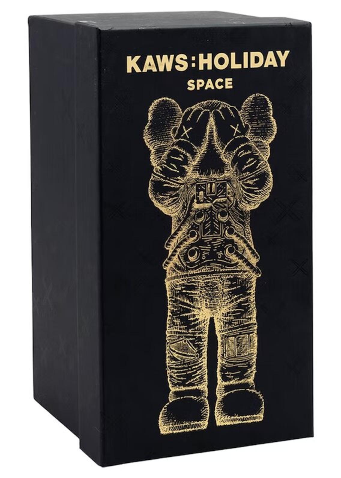 kaws gold statue