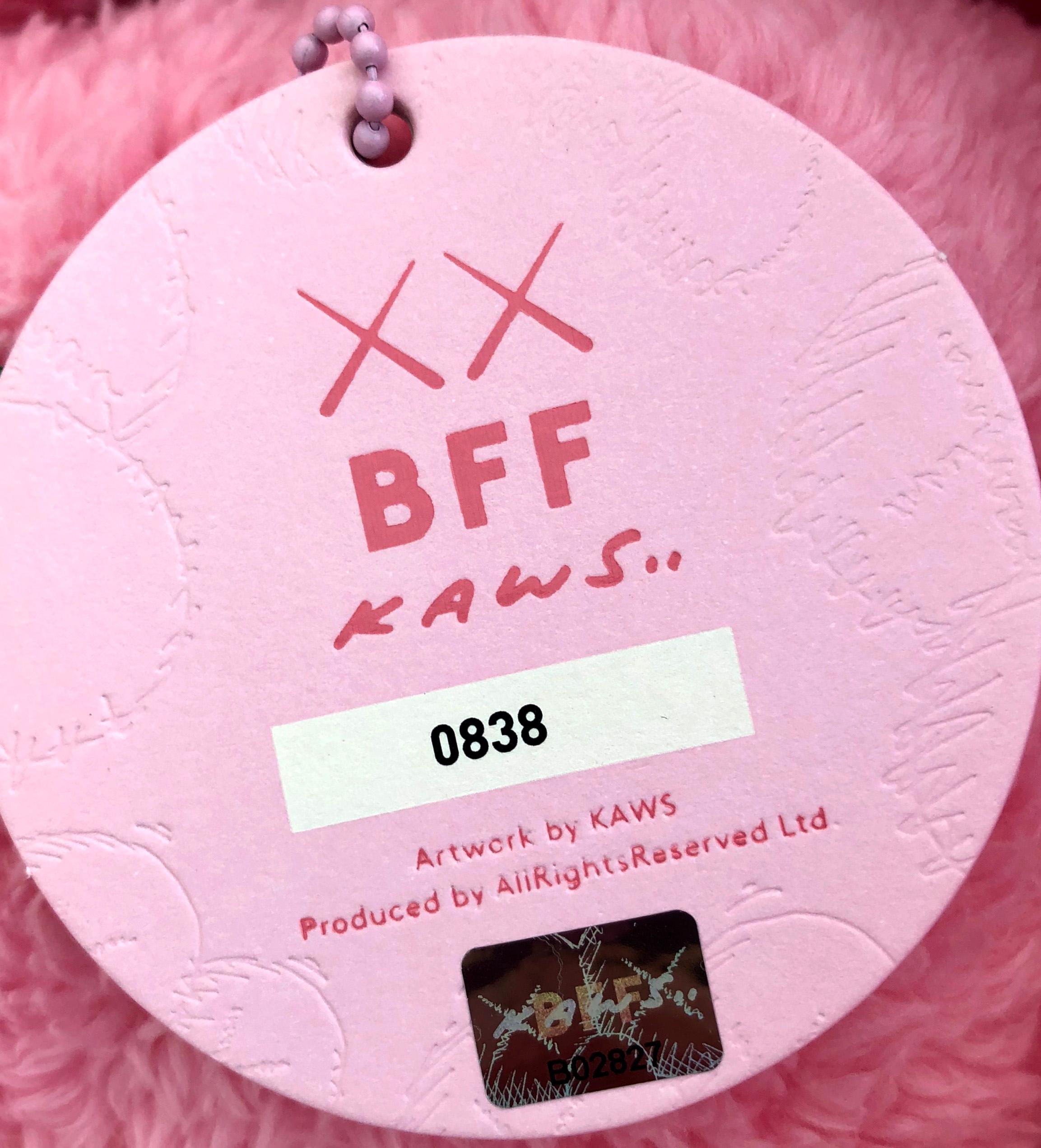 KAWS BFF Plush Companion (KAWS Pink BFF Plush) 
New in its original packaging. As only 3,000 pieces were produced, the pink plush was sought-after and coveted by fans and collectors alike, and while most were unable to get their hands on the piece.