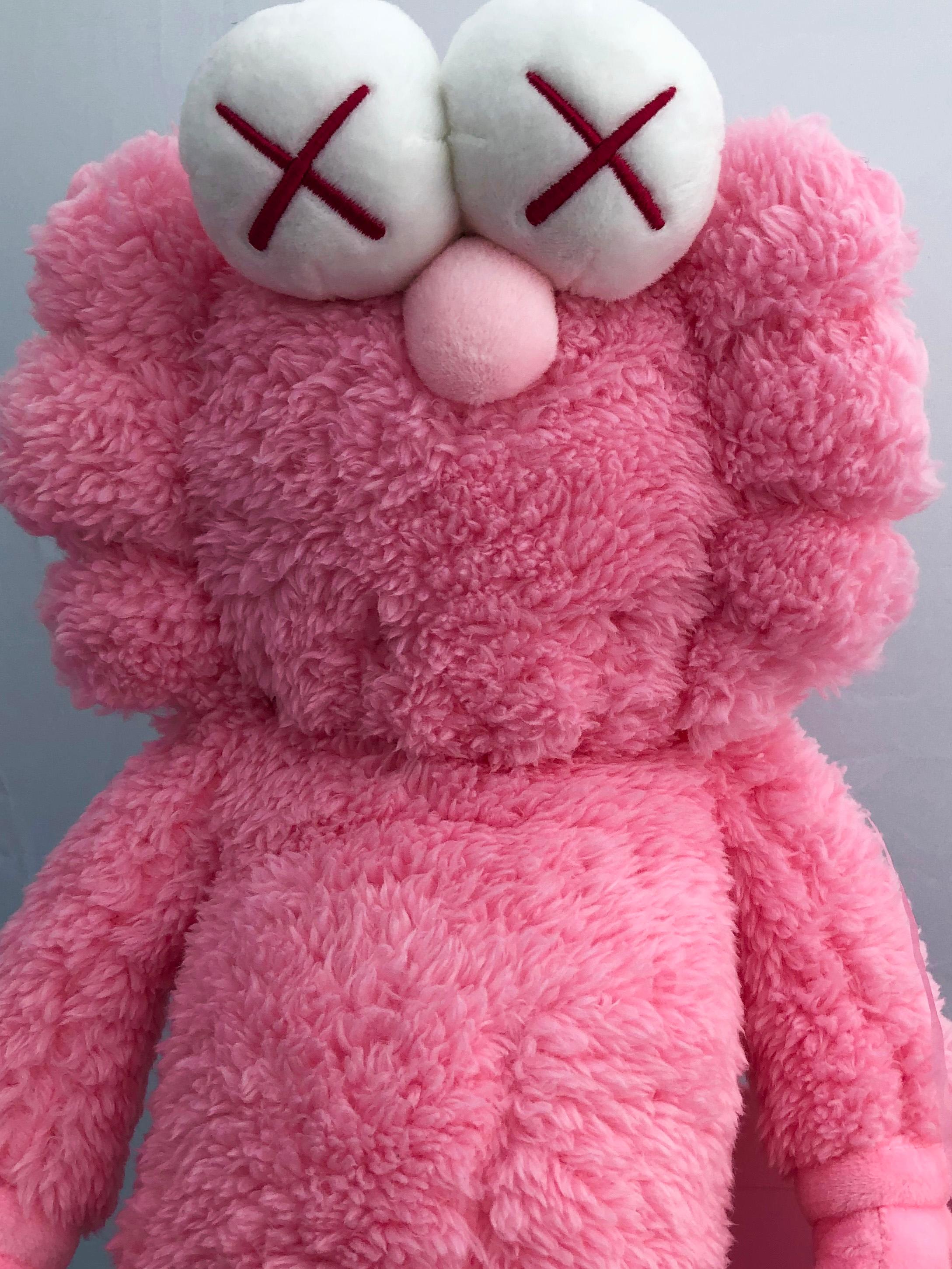 KAWS BFF Plush Companion (KAWS Pink BFF Plush) 
New in its original packaging. As only 3,000 pieces were produced, the pink plush was sought-after and coveted by fans and collectors alike, and while most were unable to get their hands on the piece.