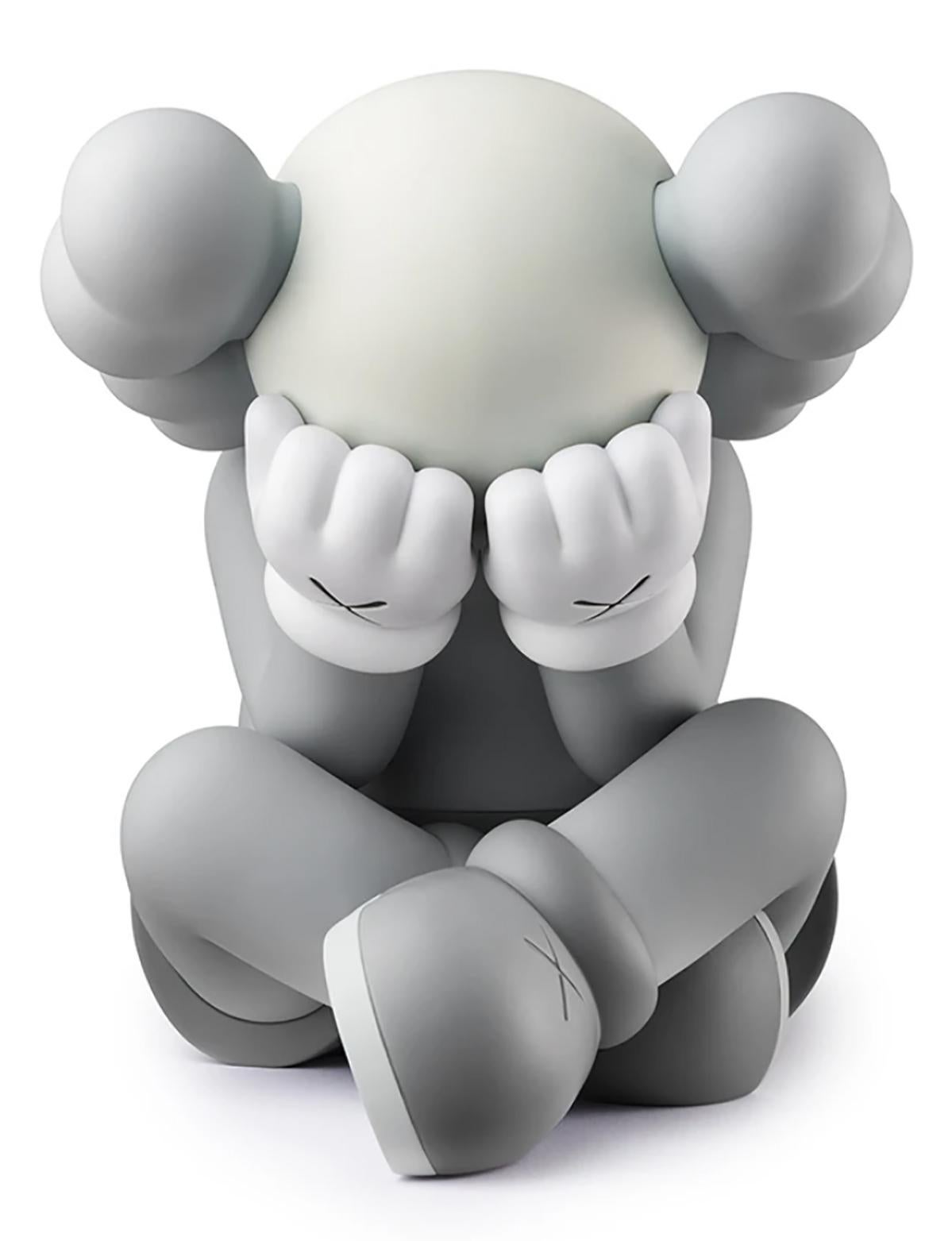 KAWS SEPARATED COMPANION: New & unopened in its original packaging:
This highly collectible grey KAWS SEPARATED figure is derived from the Brooklyn based artist’s larger scale sculpture of same (originally constructed in 2019), and is a key