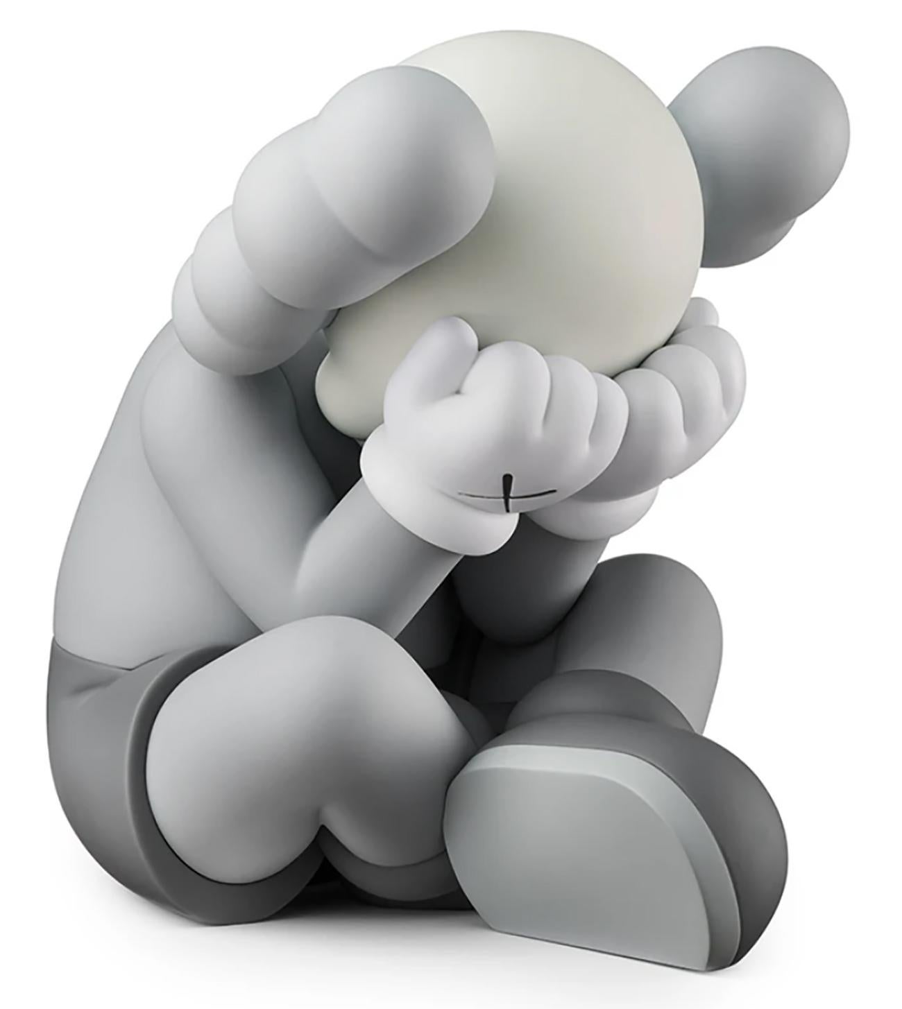 kaws separated vinyl figure