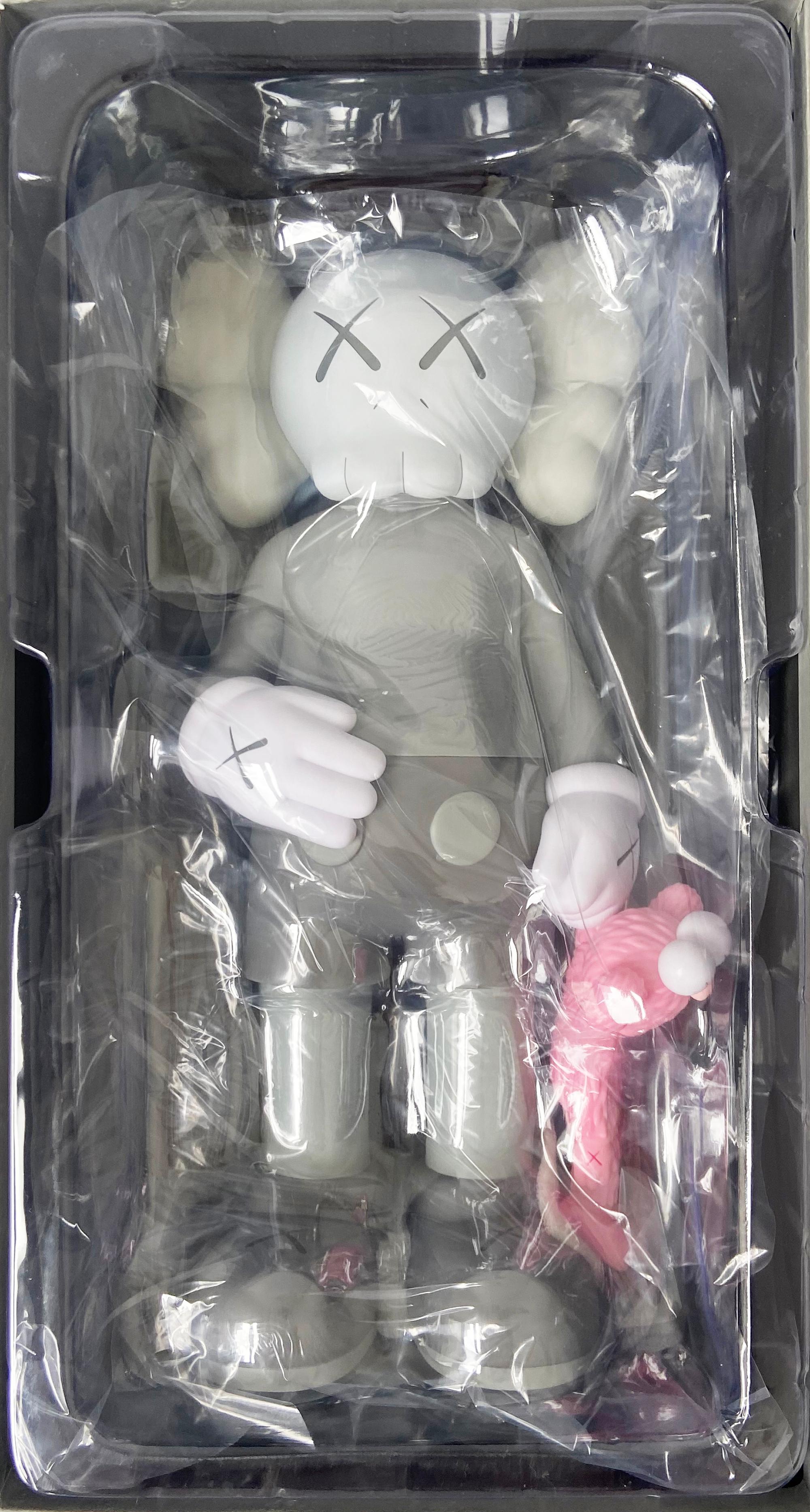 KAWS SHARE (Grey), new & unopened in its original packaging. 
KAWS SHARE first appeared in 'BLACKOUT' – the first London solo exhibition by KAWS (Skarstedt London 2019). In SHARE, KAWS uses two of his characters to convey opposing human attitudes-