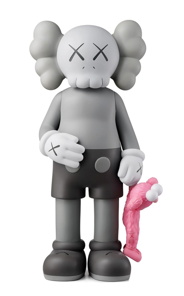 KAWS SHARE (Grey), new & unopened in its original packaging. 
KAWS SHARE first appeared in 'BLACKOUT' – the first London solo exhibition by KAWS (Skarstedt London 2019). In SHARE, KAWS uses two of his characters to convey opposing human attitudes-