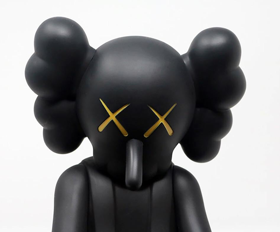 KAWS Black Small Lie Companion figure 2017 

Medium: Vinyl figurine 
Dimensions: 11 × 4.5 × 4.5 inches 
Unopened; excellent condition 
Published by Medicom Japan.
From an unnumbered edition of unknown 
Authenticity guaranteed 

KAWS
A leading artist