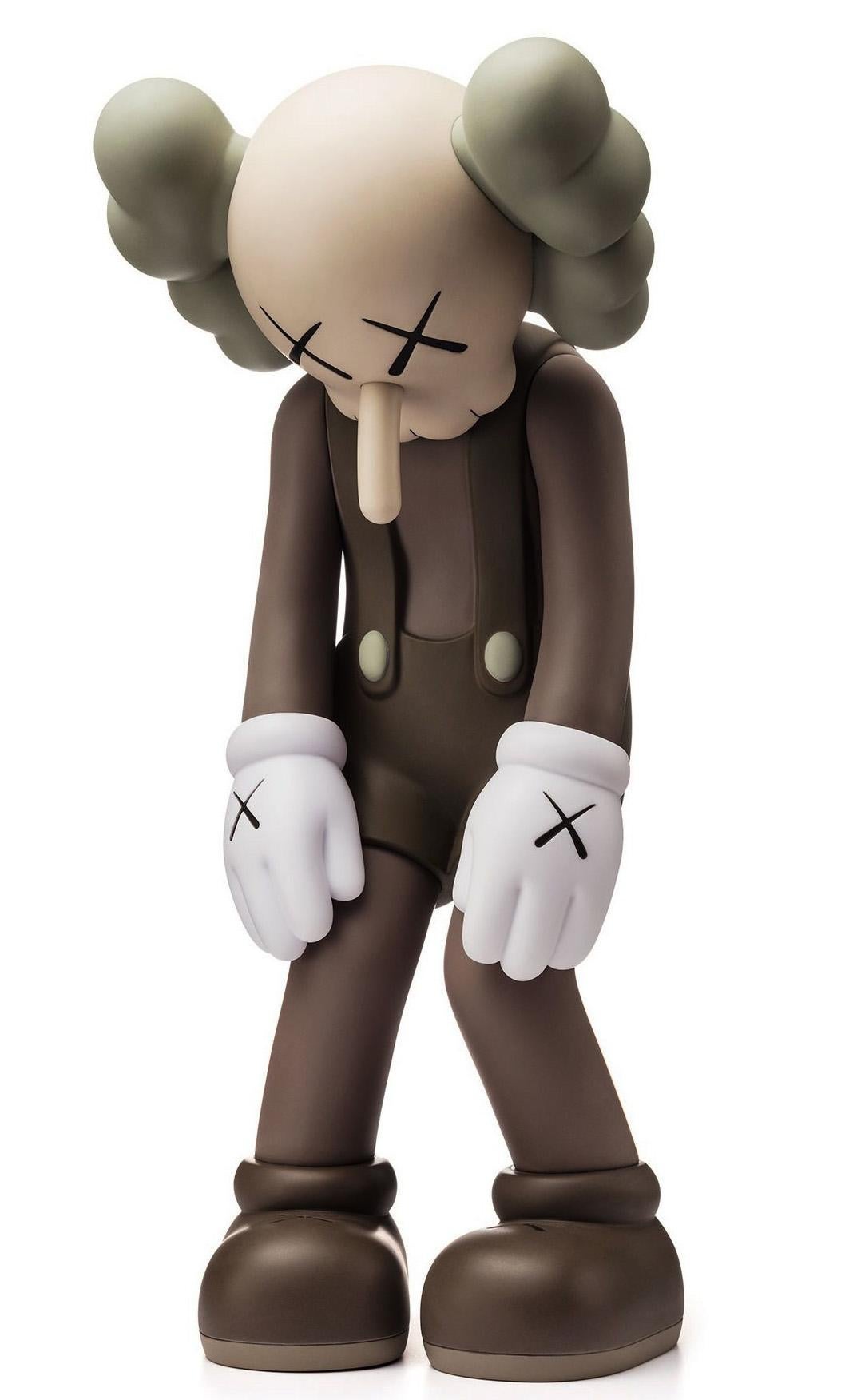 KAWS Brown Small Lie Companion 2017: 

Medium: Vinyl Figurine 
Dimensions: 11 × 4.5 × 4.5 inches.
Unopened; excellent condition 
Published by Medicom Japan.
From an unnumbered edition of unknown 
Authenticity guaranteed 

KAWS
A leading artist of