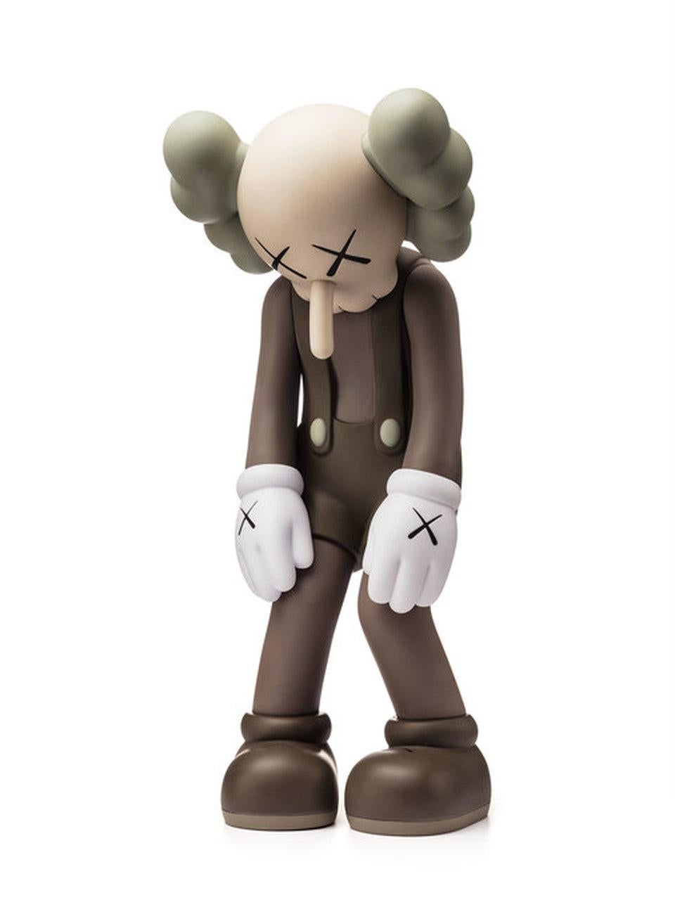 In December 2017, KAWS released a new version of his classic companion character, titled "Small Lie". The figure features the companion slumped over in what appears to be a disappointing stance, with a long nose that's reminiscent of Pinocchio. This