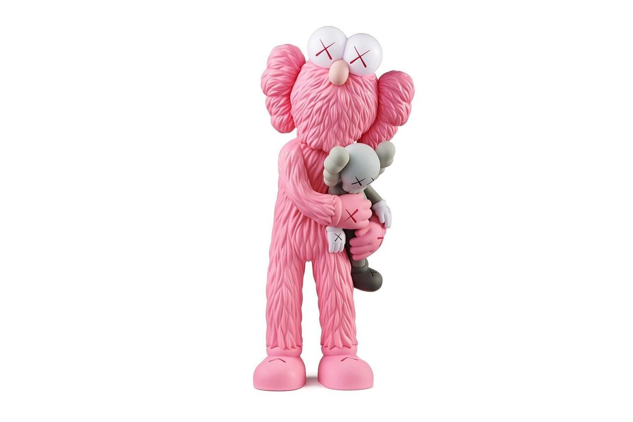 pink kaws statue