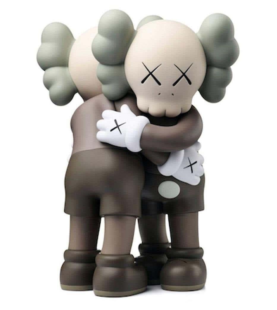 KAWS Together 2018 (Brown):
In TOGETHER, KAWS’s iconic “Companions” are interlocked, consoling each other in an everlasting hug. KAWS 1st debuted this embracing duo in 2016, presenting large-scale wooden versions at More Gallery in Switzerland and