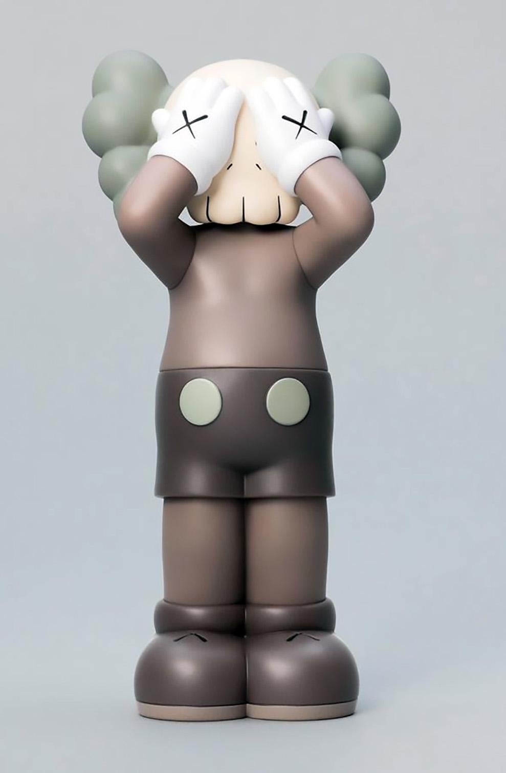 KAWS: HOLIDAY United Kingdom: Complete set of 3 works (KAWS Holiday UK): 
KAWS' signature character COMPANION presented in an upright standing position with its eyes covered. 3 individual works (black, brown, & grey), each new in their original