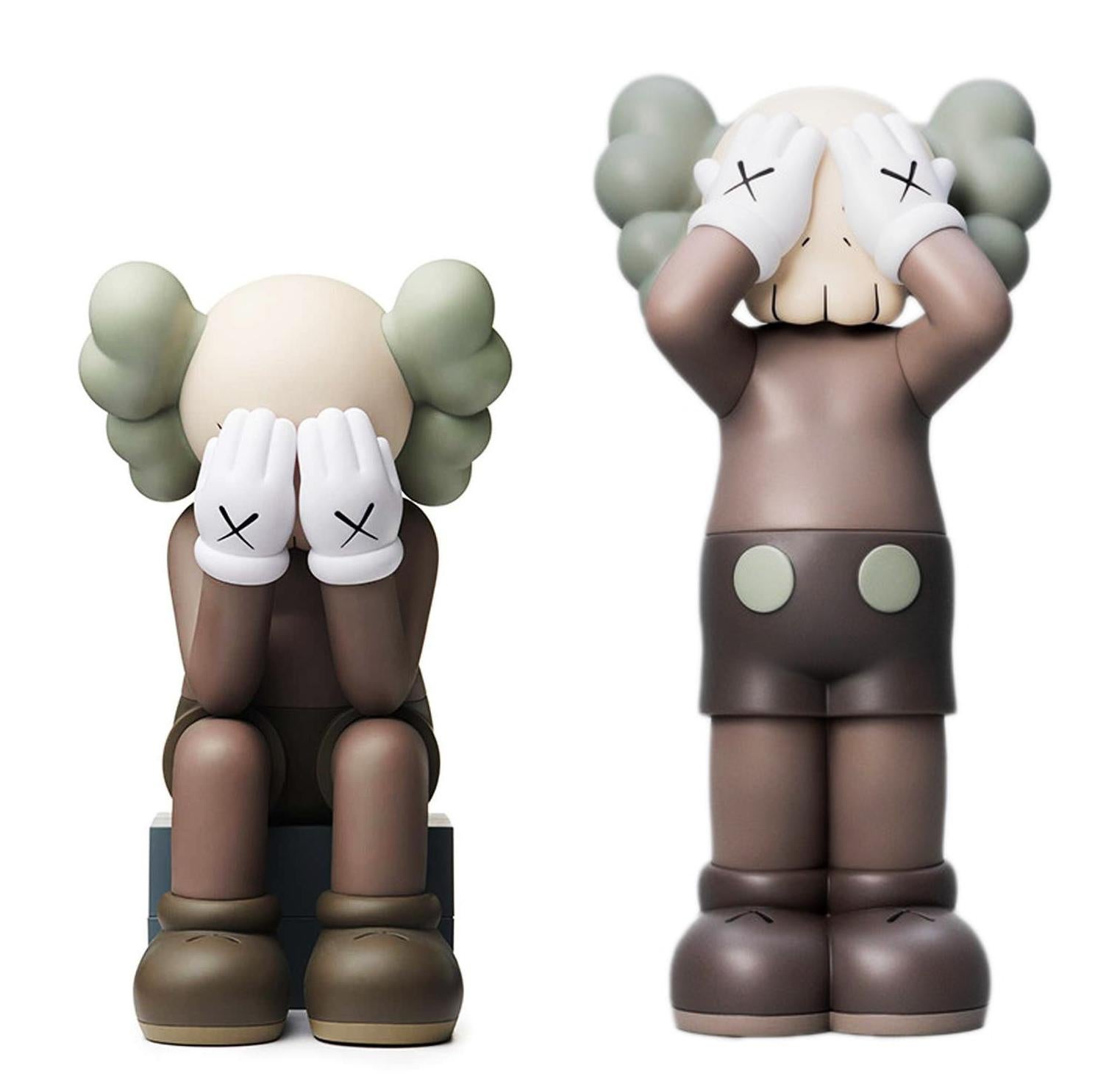 KAWS UK Holiday Companion Brown & KAWS Passing through: 2 works:

KAWS UK Holiday:
KAWS' signature character COMPANION presented in an upright and seated position with its eyes covered. Published to commemorate the debut of KAWS’ large sculptures of