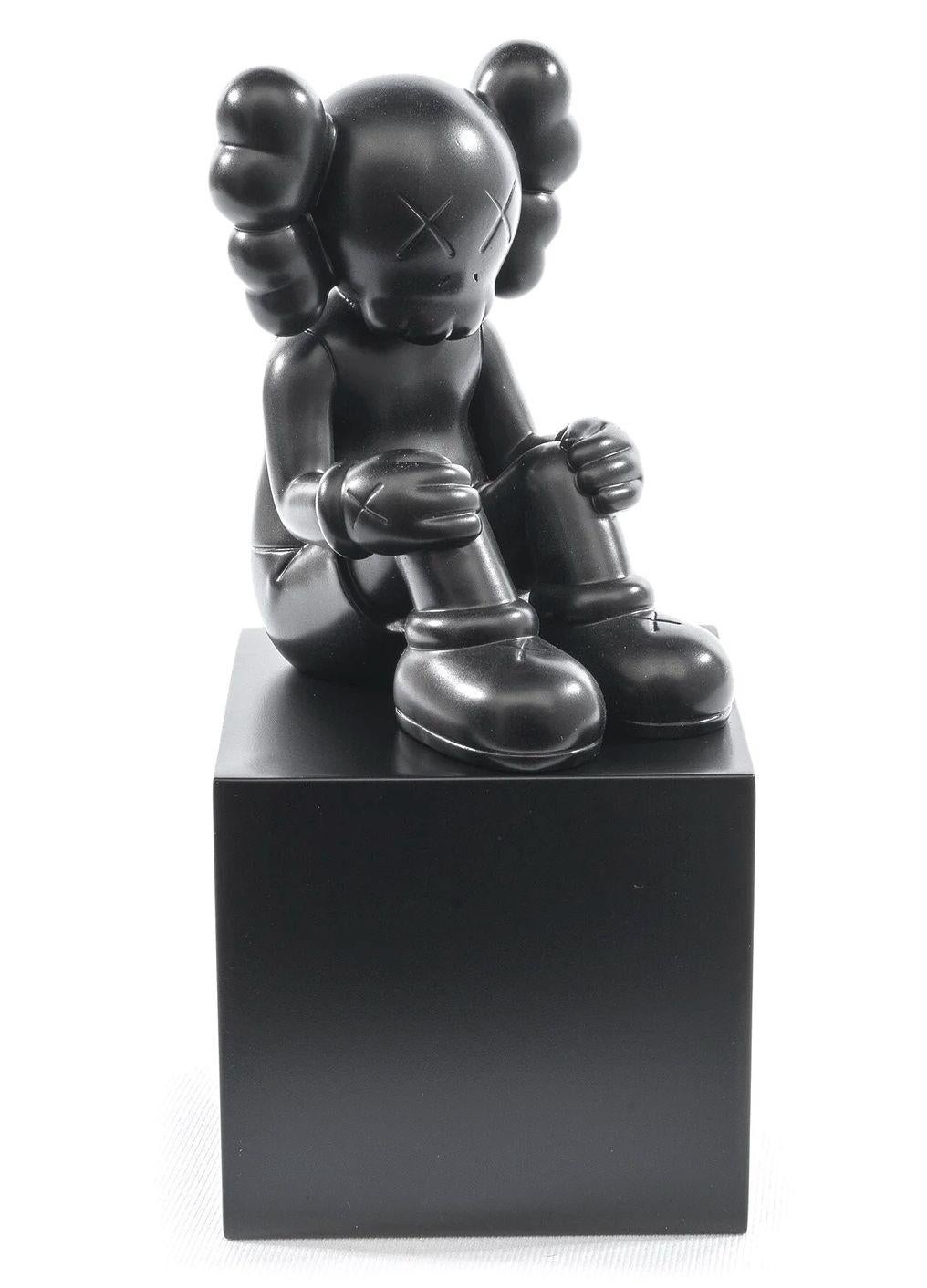 How do I tell if a KAWS figure is real?