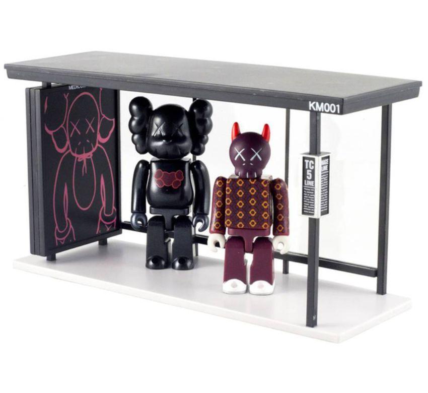 Kubrick 100% and Bus Stop 2 - Sculpture by KAWS