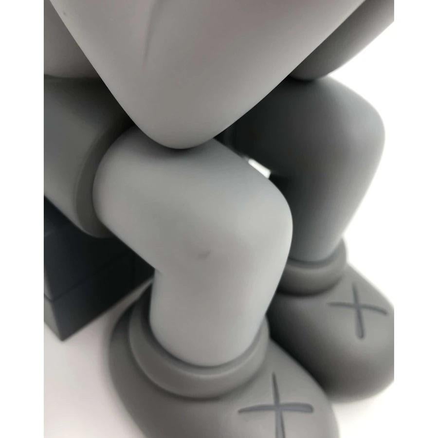 Passing Through (Mono) - Gray Figurative Sculpture by KAWS