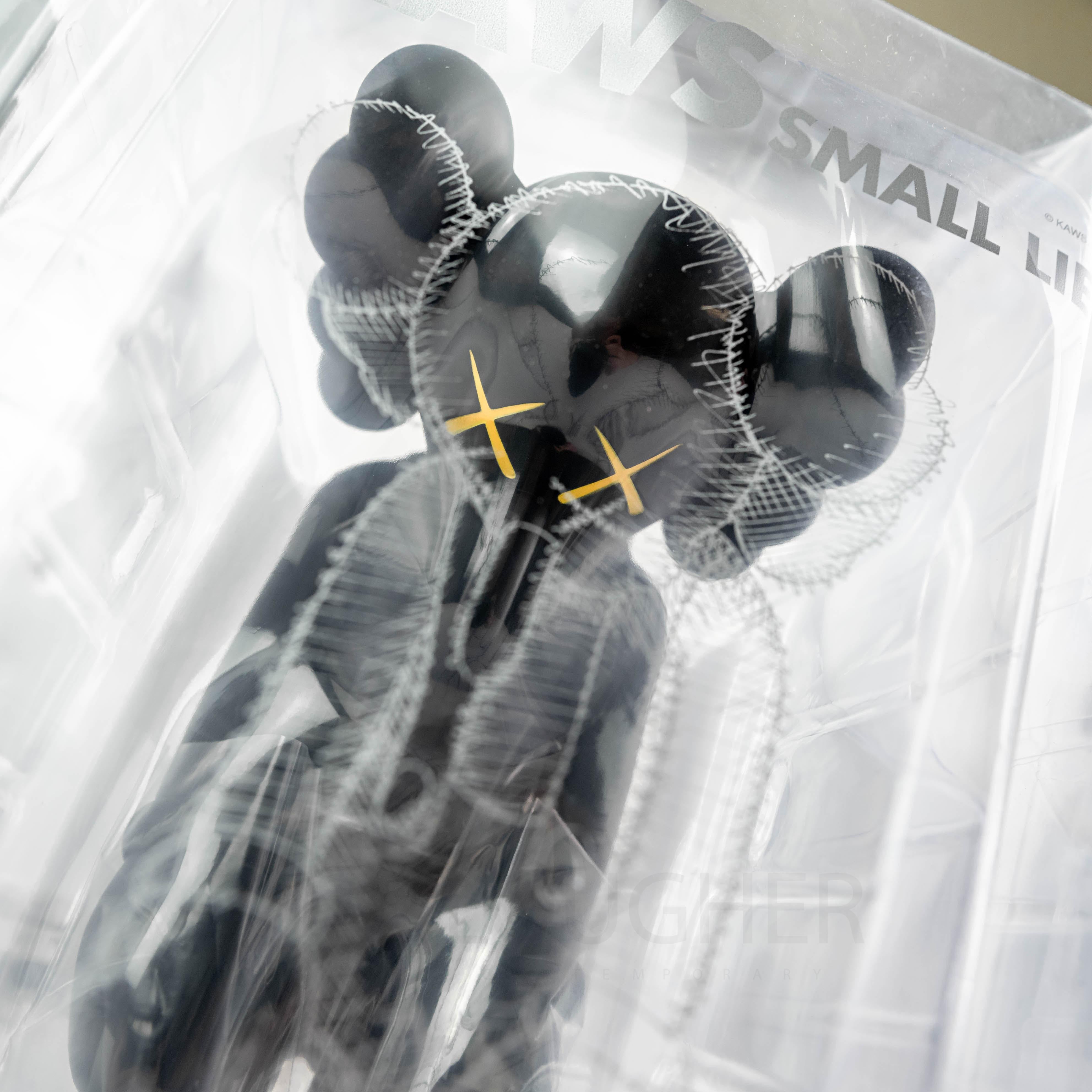 Small Lie (Set Of Three) - Sculpture by KAWS